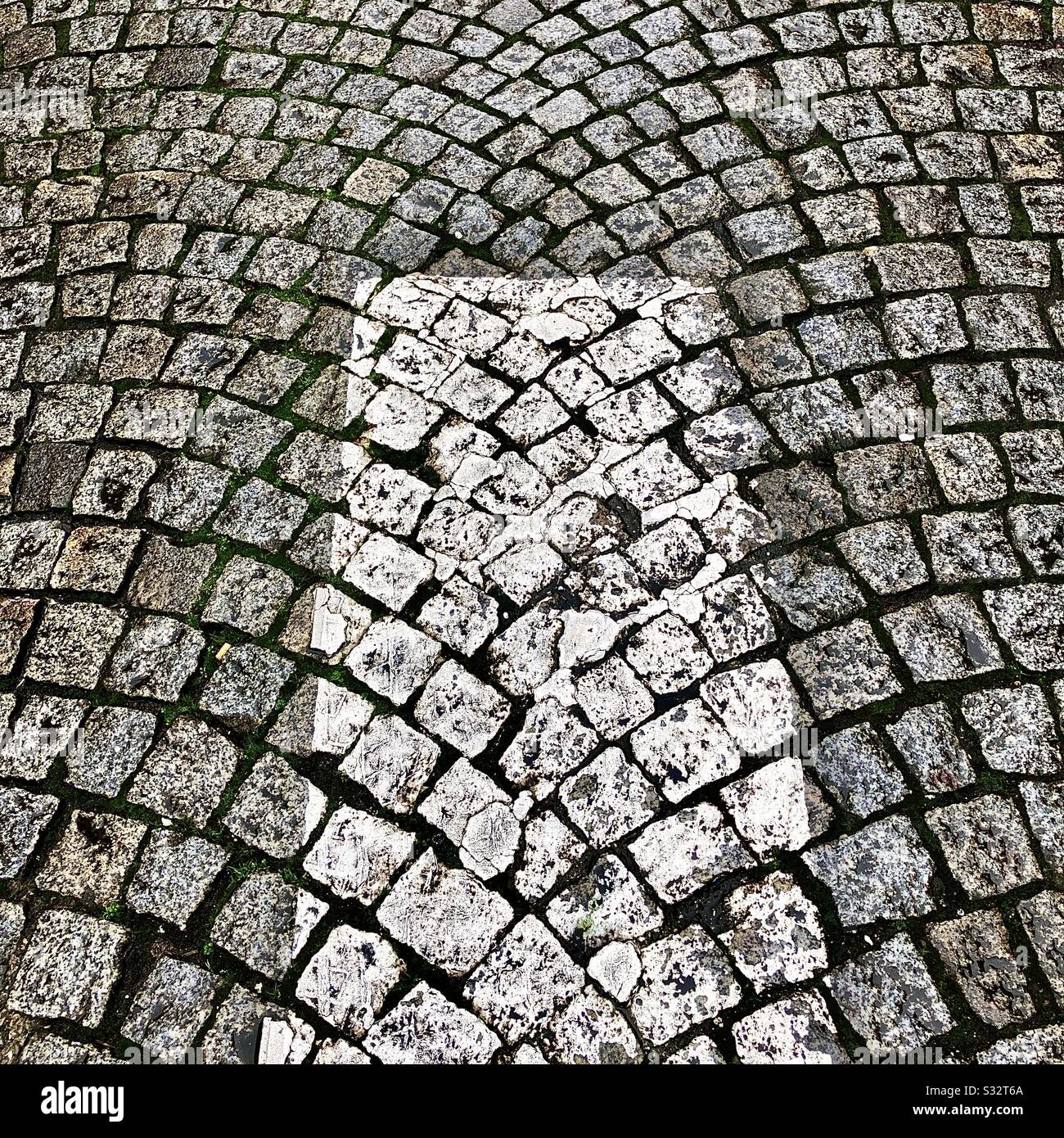 Vecchia superficie di strada acciottolata francese. Foto Stock