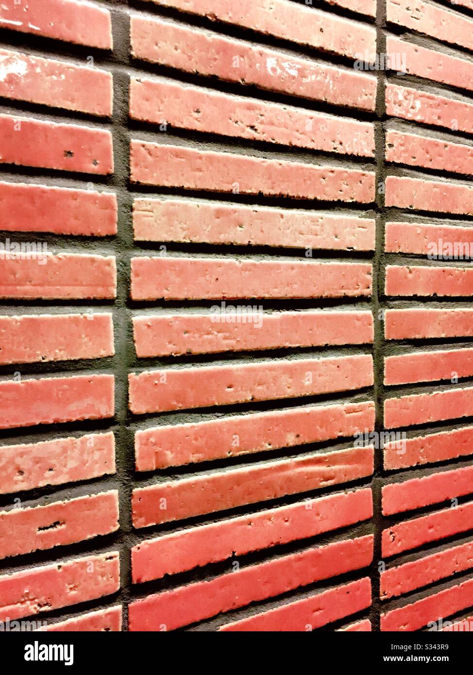 Primo piano di una parete vetrata in ceramica. Foto Stock