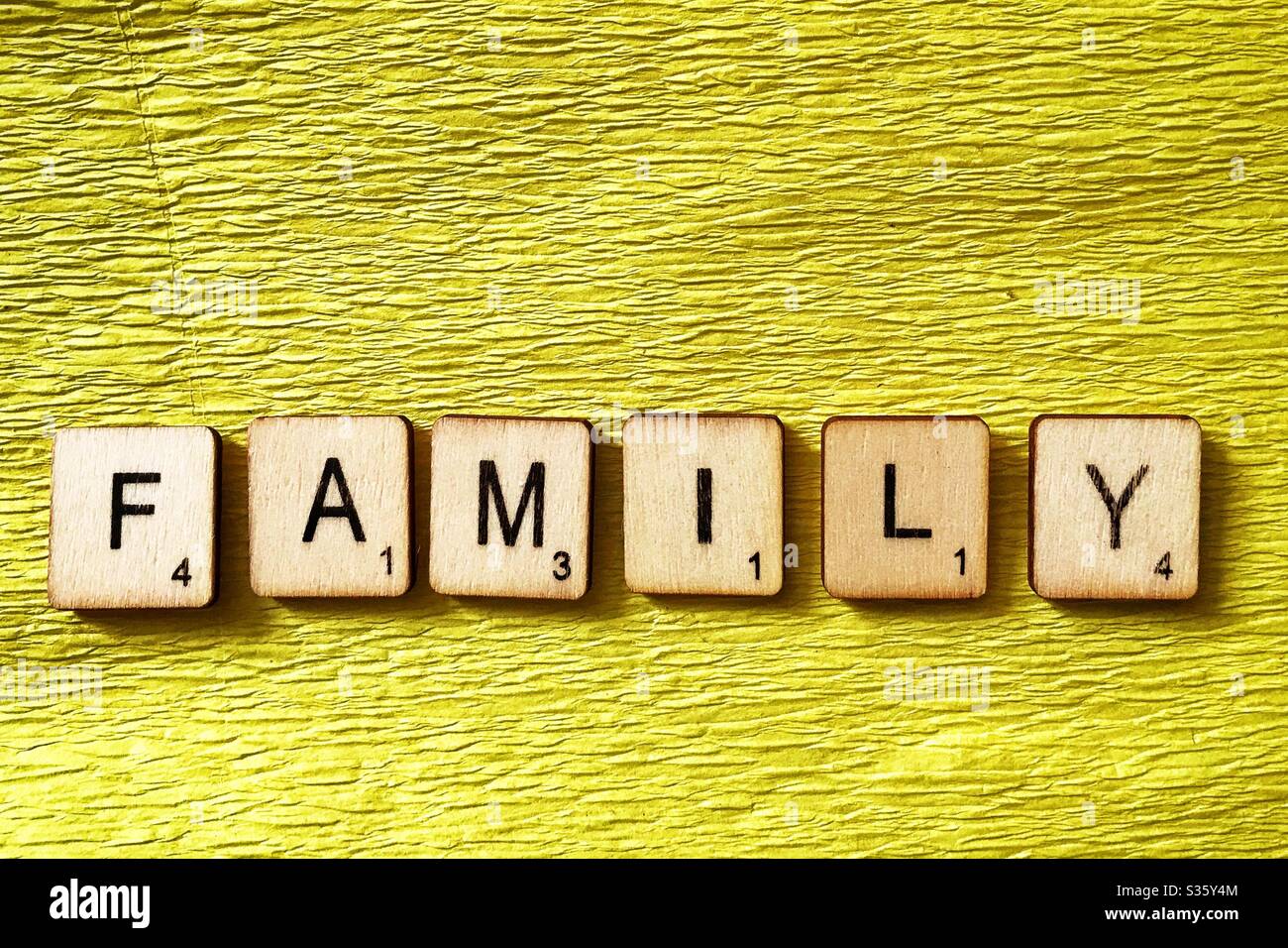 Le mattonelle di legno incantano fuori la famiglia. Foto Stock