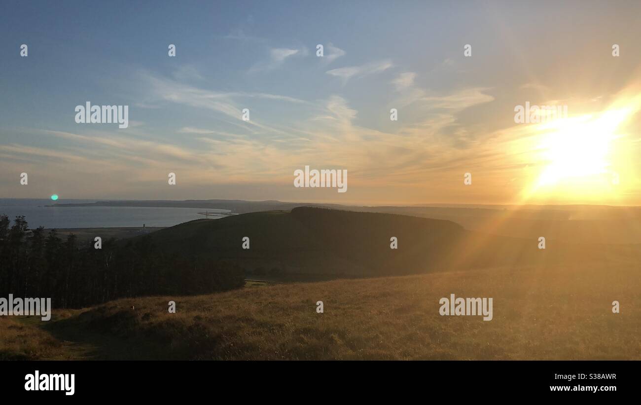 Tramonto su Port Talbot/Swansea Foto Stock