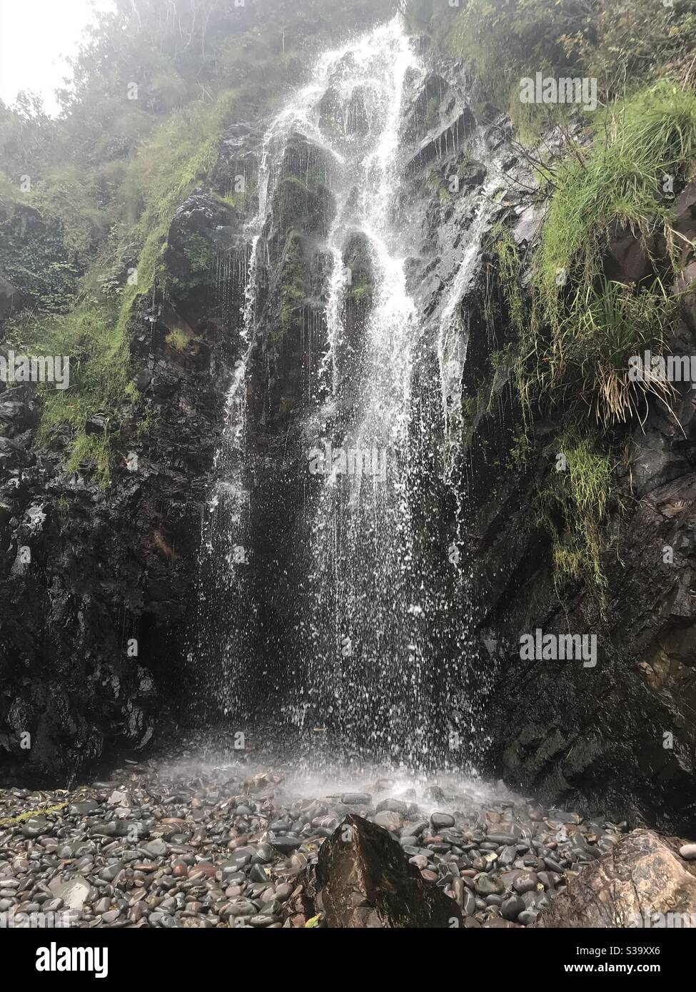 Cornish Waterfall, Regno Unito Foto Stock