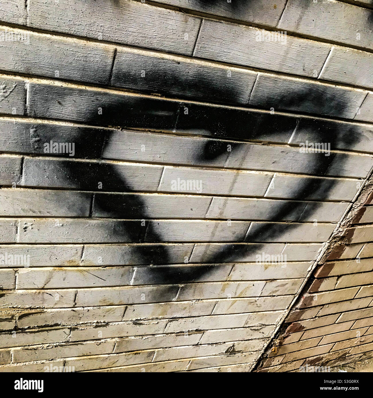 Graffiti a cuore nero Foto Stock