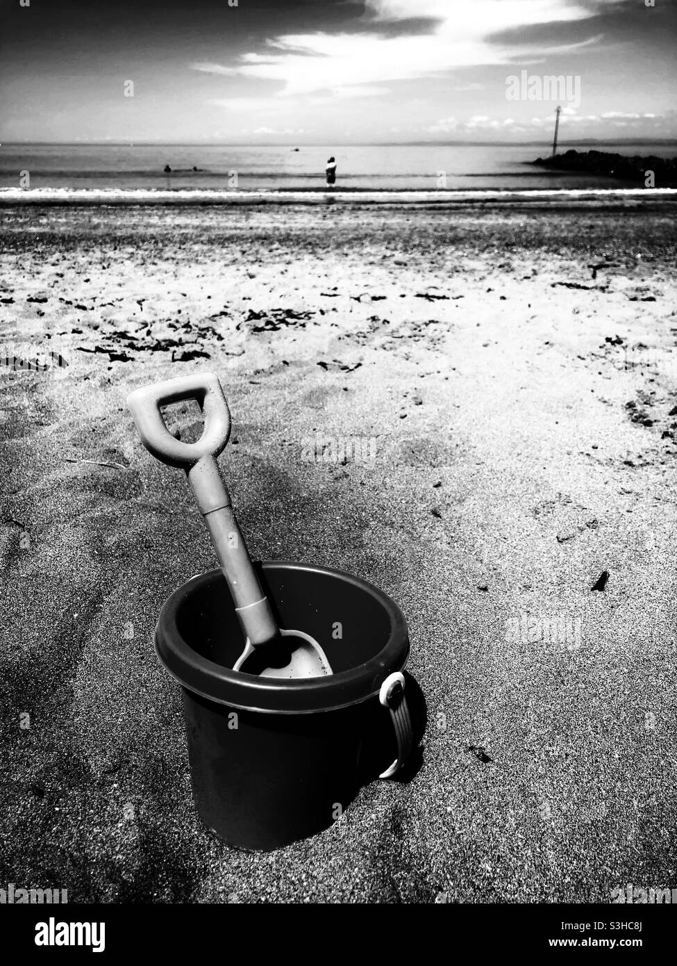 Benna e vanga, spiaggia di Minehead, Regno Unito Foto Stock