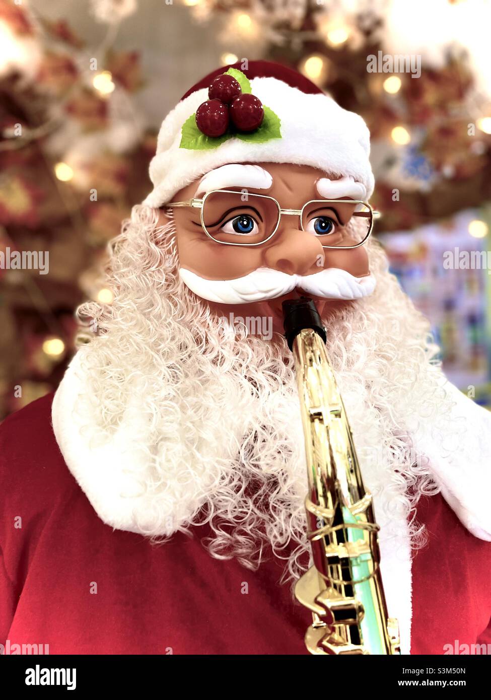 Tromba giocando a Babbo Natale Foto stock - Alamy