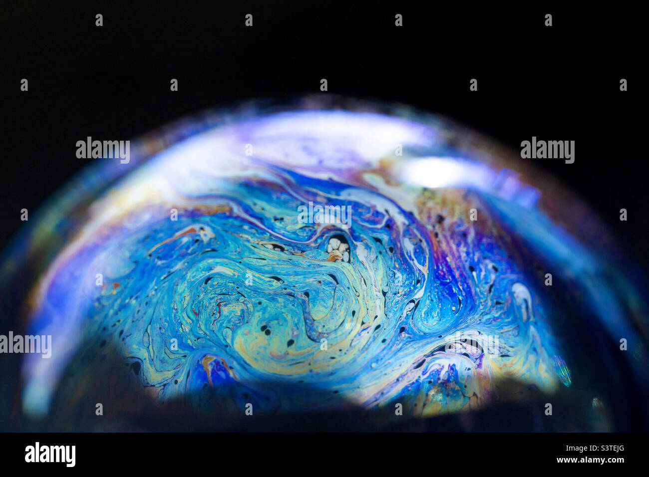 Mondo astratto nella bolla di sapone, macro pianeta - Immagine stock catturata con smartphone
