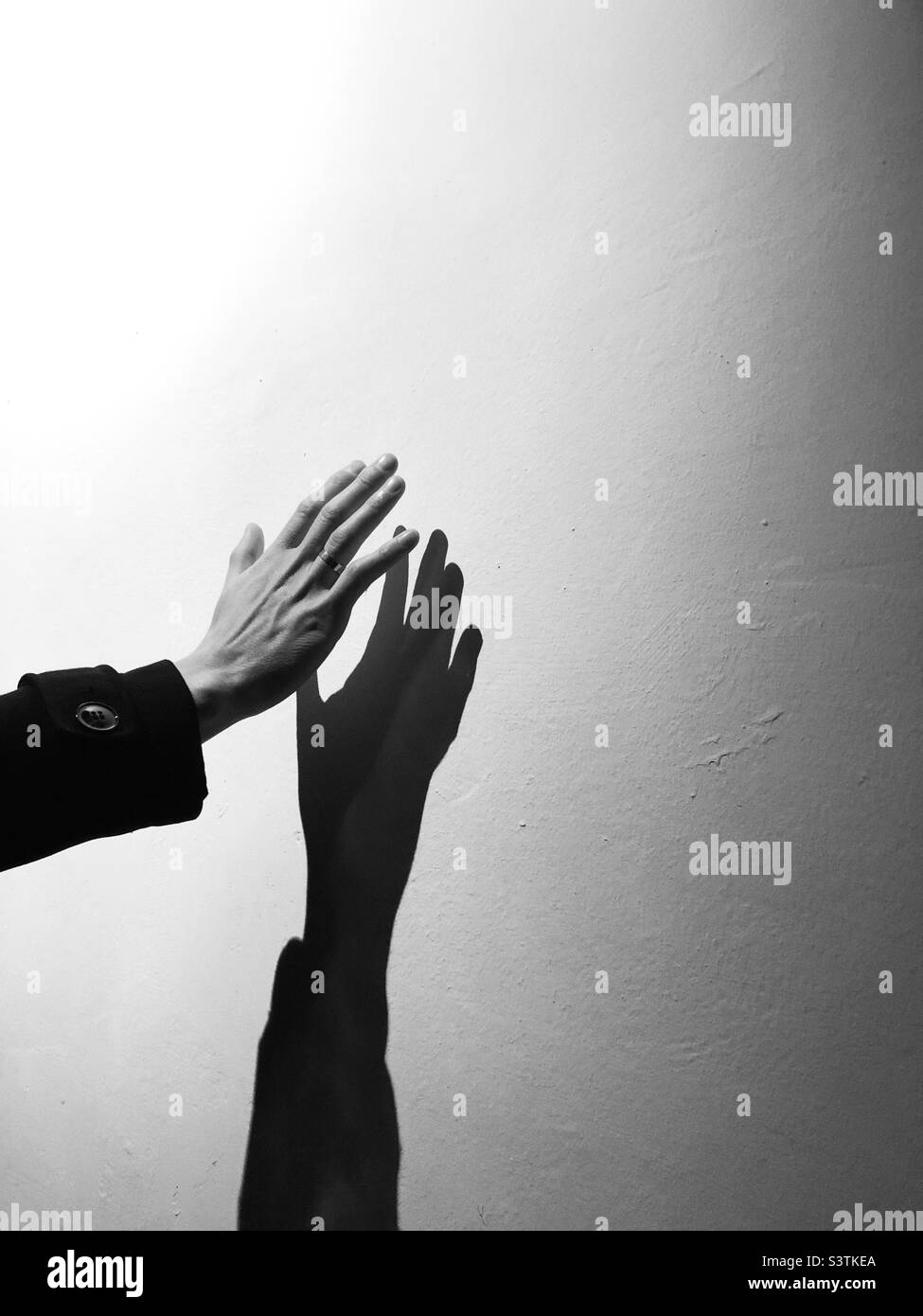 Ombra della mano Foto Stock