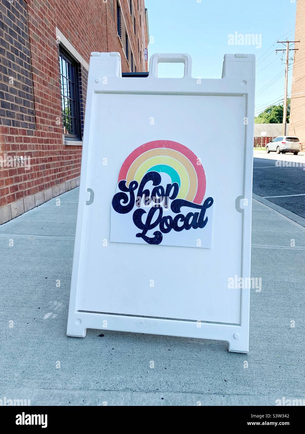 Negozio locale segno in città, New York state Foto Stock