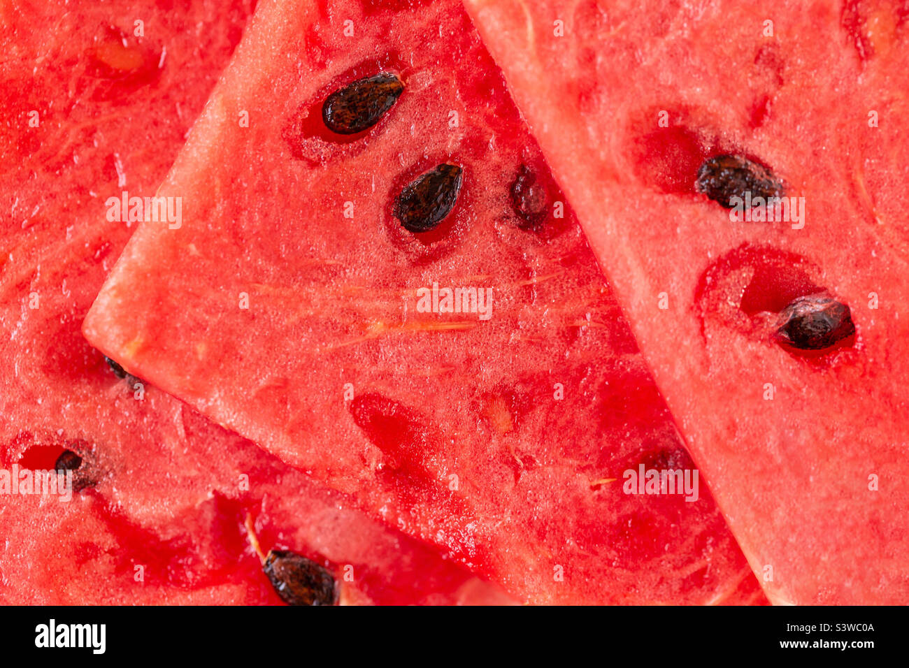 Fresche e succose fette di cocomero, sfondo macro closeup - Immagine stock catturata con smartphone Fresche e succose fette di cocomero, sfondo macro closeup - Immagine stock catturata con smartphone