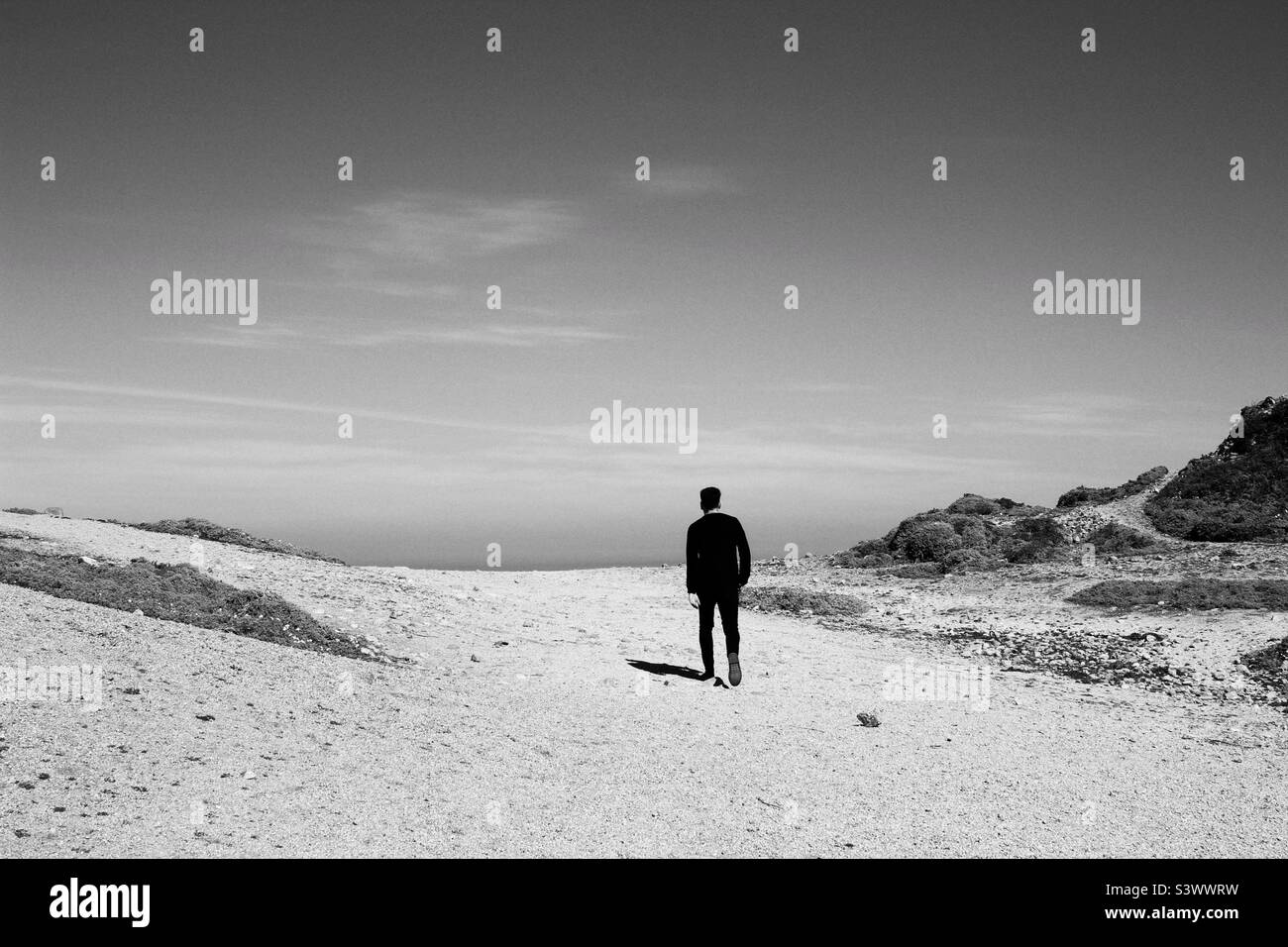 Uomo che cammina Foto Stock