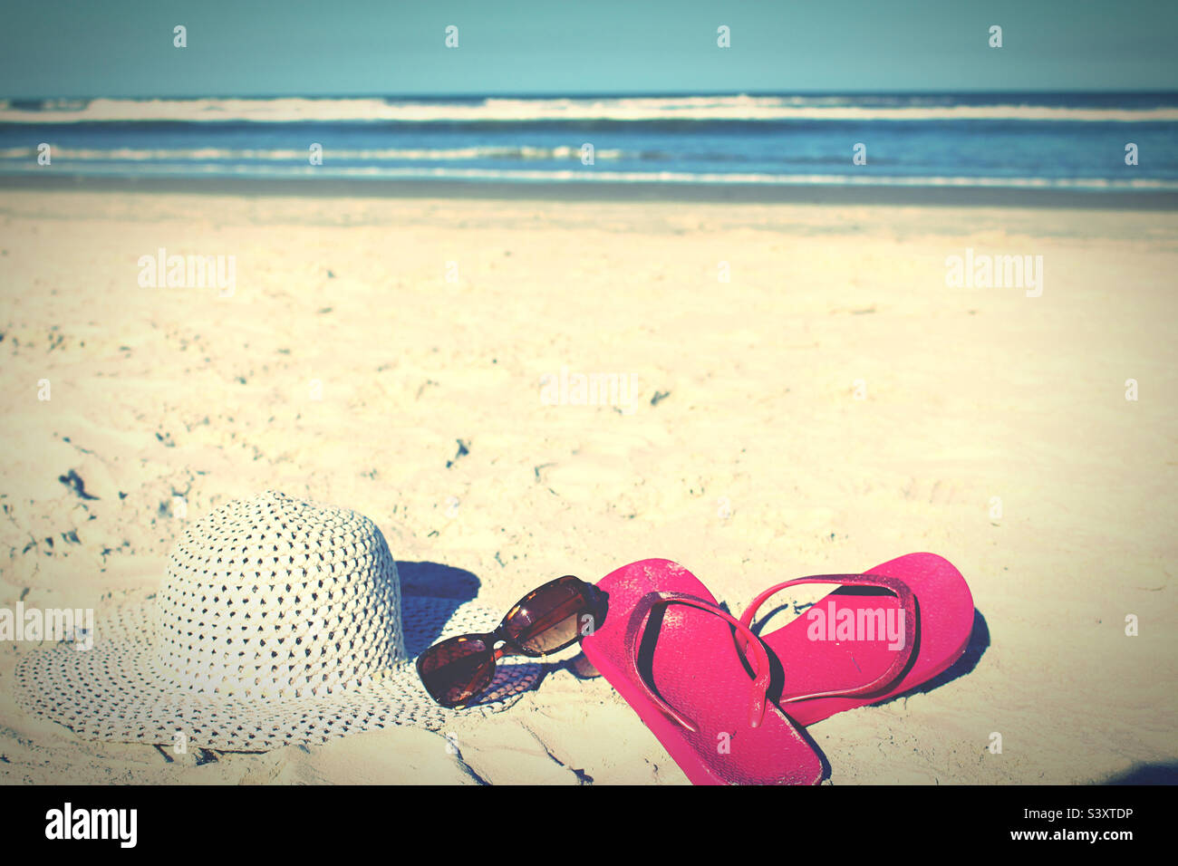 A rilassarci in spiaggia Foto Stock