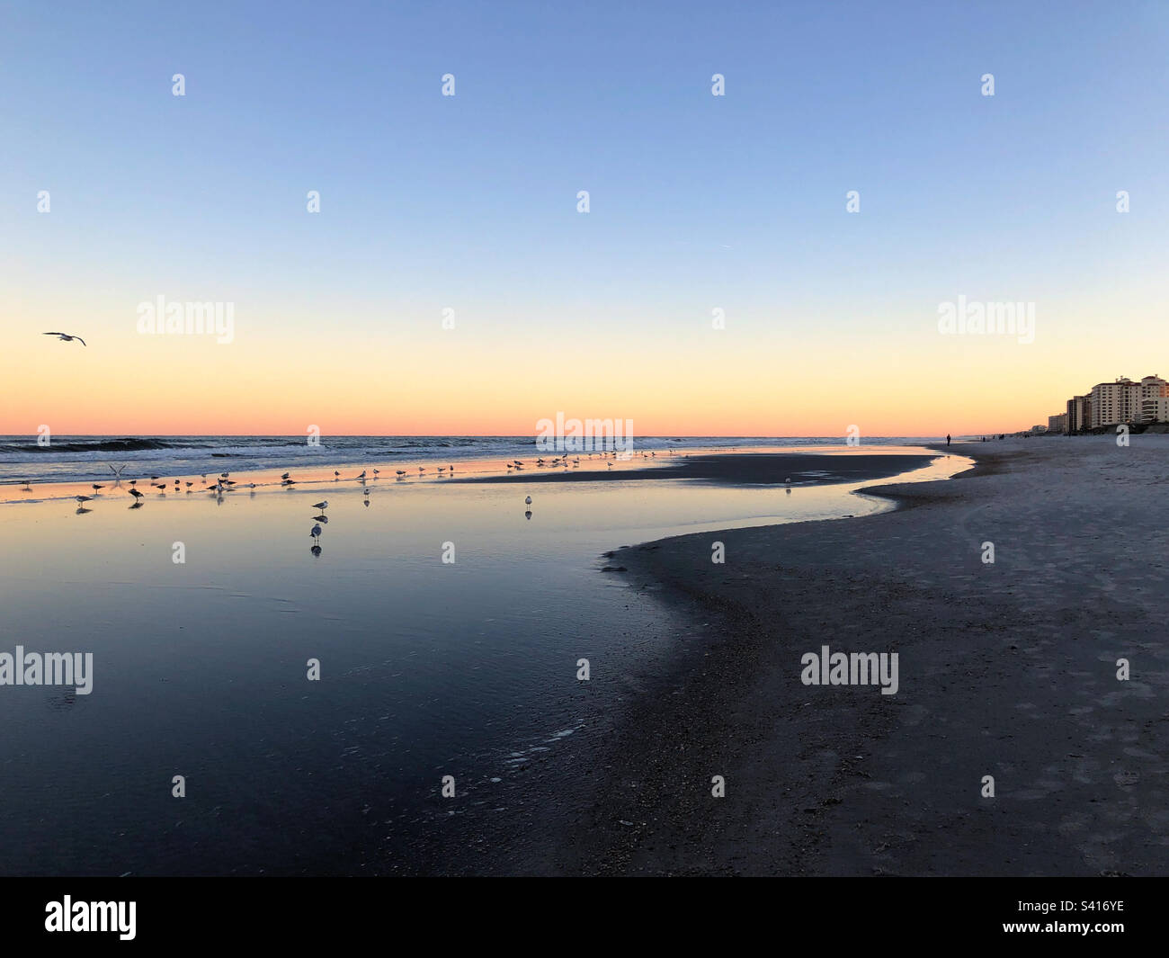 Jacksonville Beach, Florida USA al tramonto - Immagine stock catturata con smartphone
