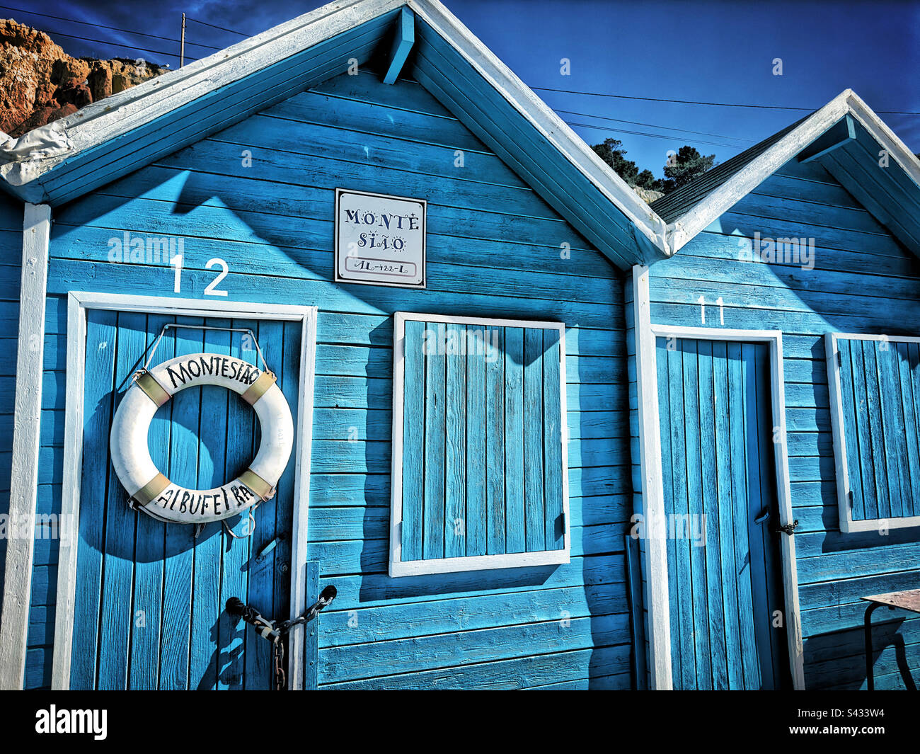 Capanne dei pescatori sulla spiaggia Foto Stock