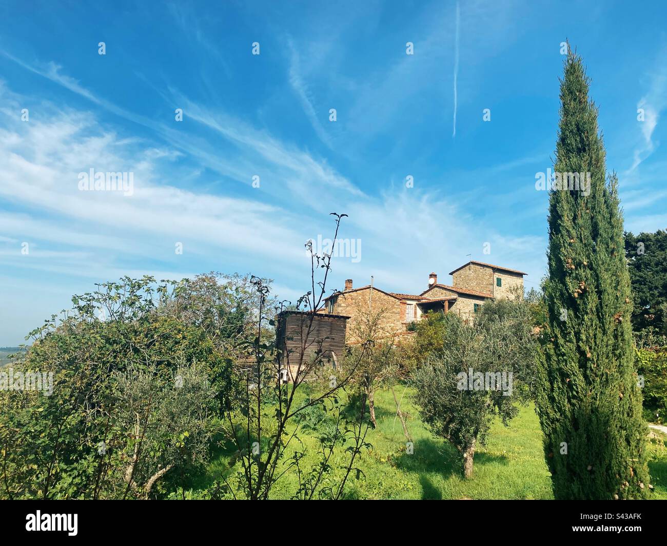 Casa di campagna toscana in mattoni a lato in Chianti Italia Foto Stock