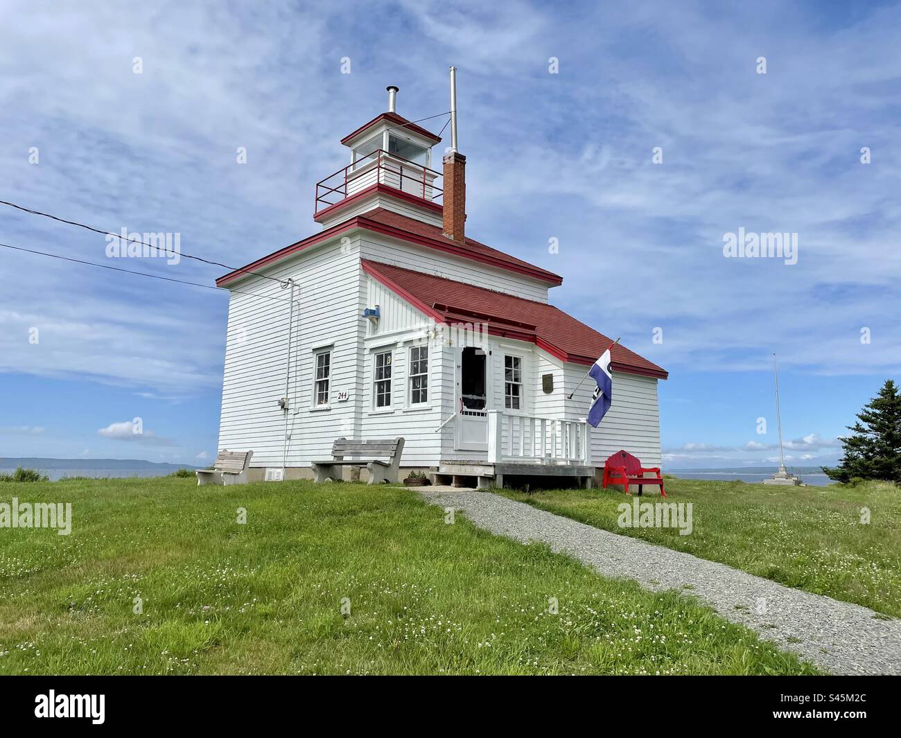 Thé Gllbert's Cove Lighthouse operò dal 1904 al 1972. Smantellata e restaurata nel 1984, da allora è stata aperta al pubblico con un piccolo museo e sala da tè. - Immagine stock catturata con smartphone