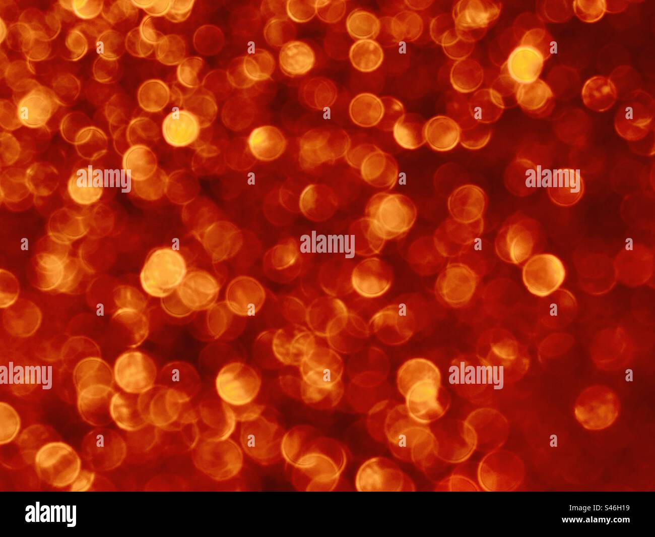 Bokeh glitter arancione - Immagine stock catturata con smartphone