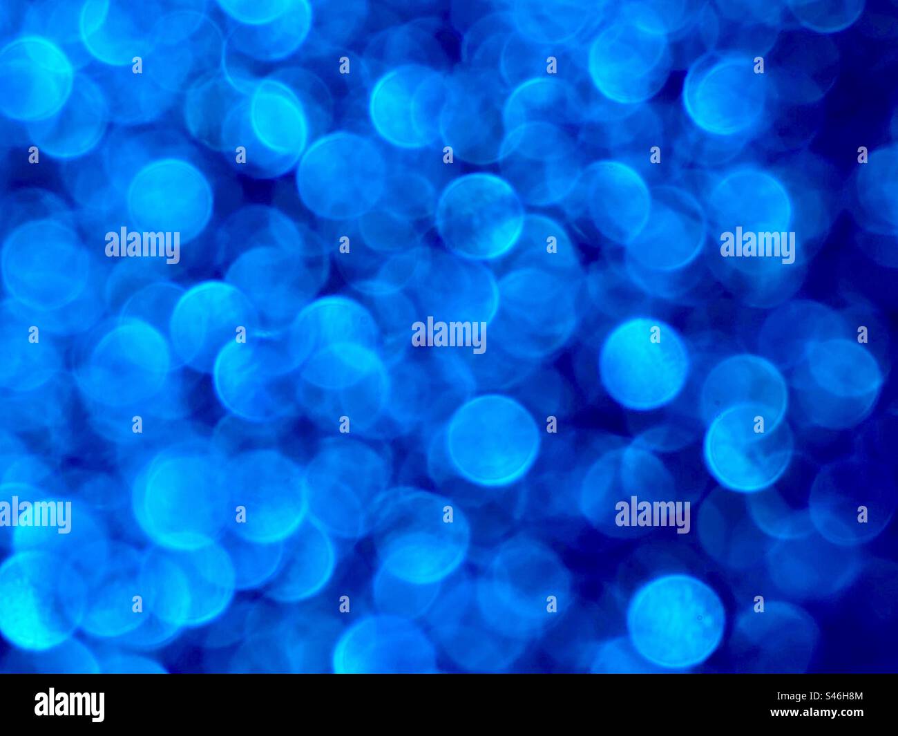Effetto bokeh blu brillante Foto Stock