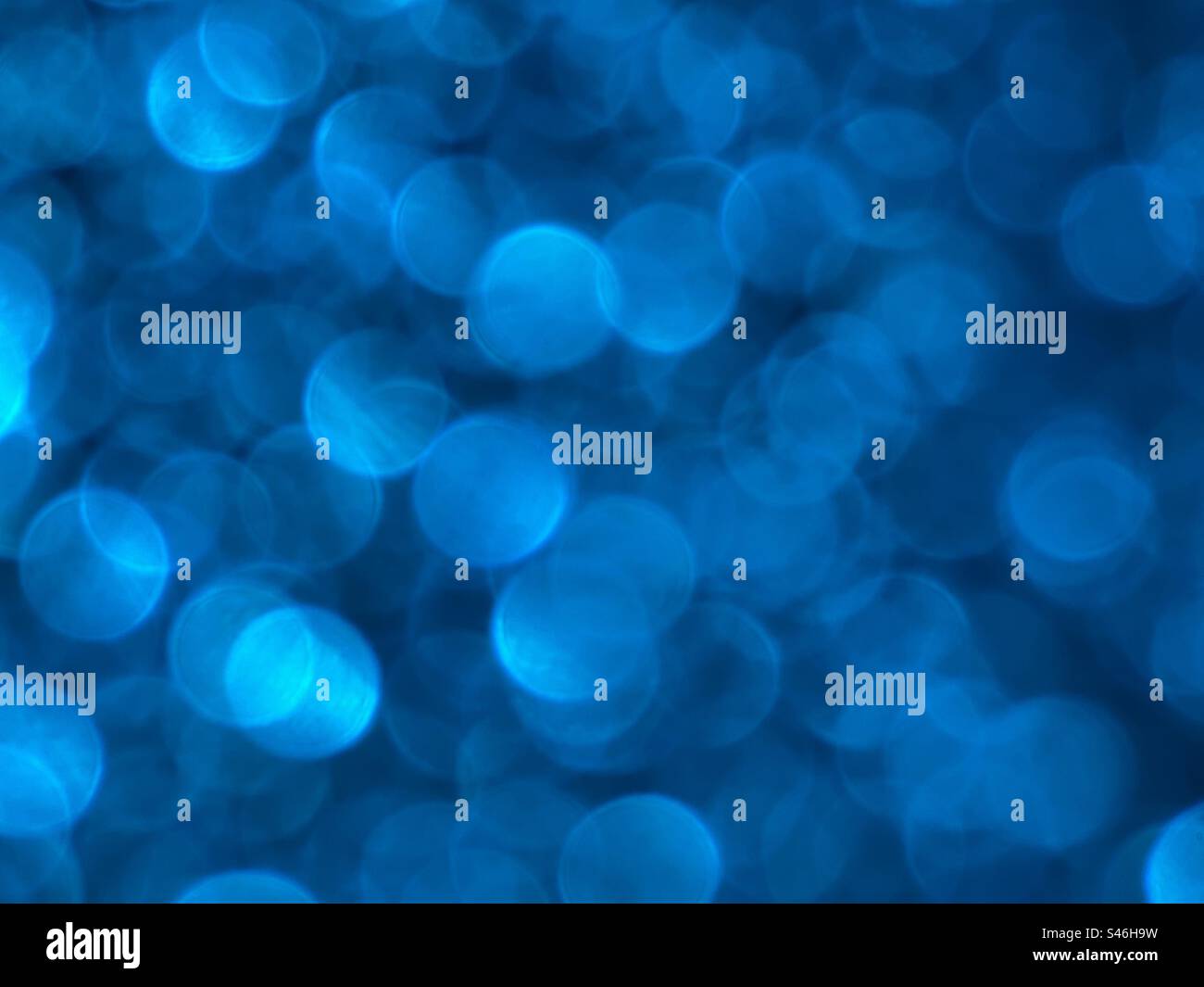 Effetto bokeh blu brillante - Immagine stock catturata con smartphone