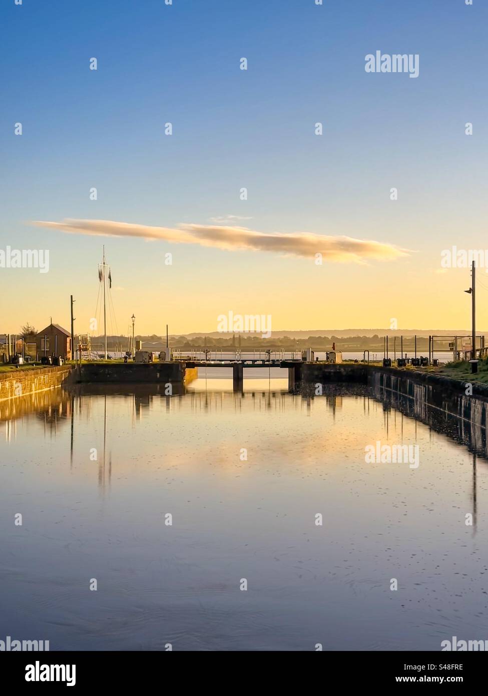 Lydney dock si prende all'alba Foto Stock