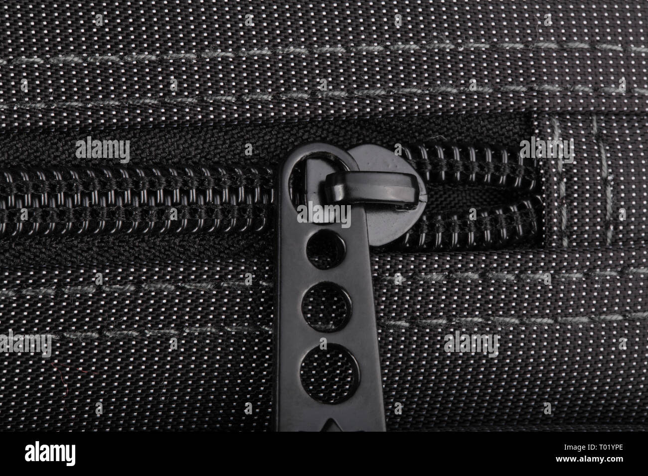 Borsa nera con puntini bianchi Foto Stock