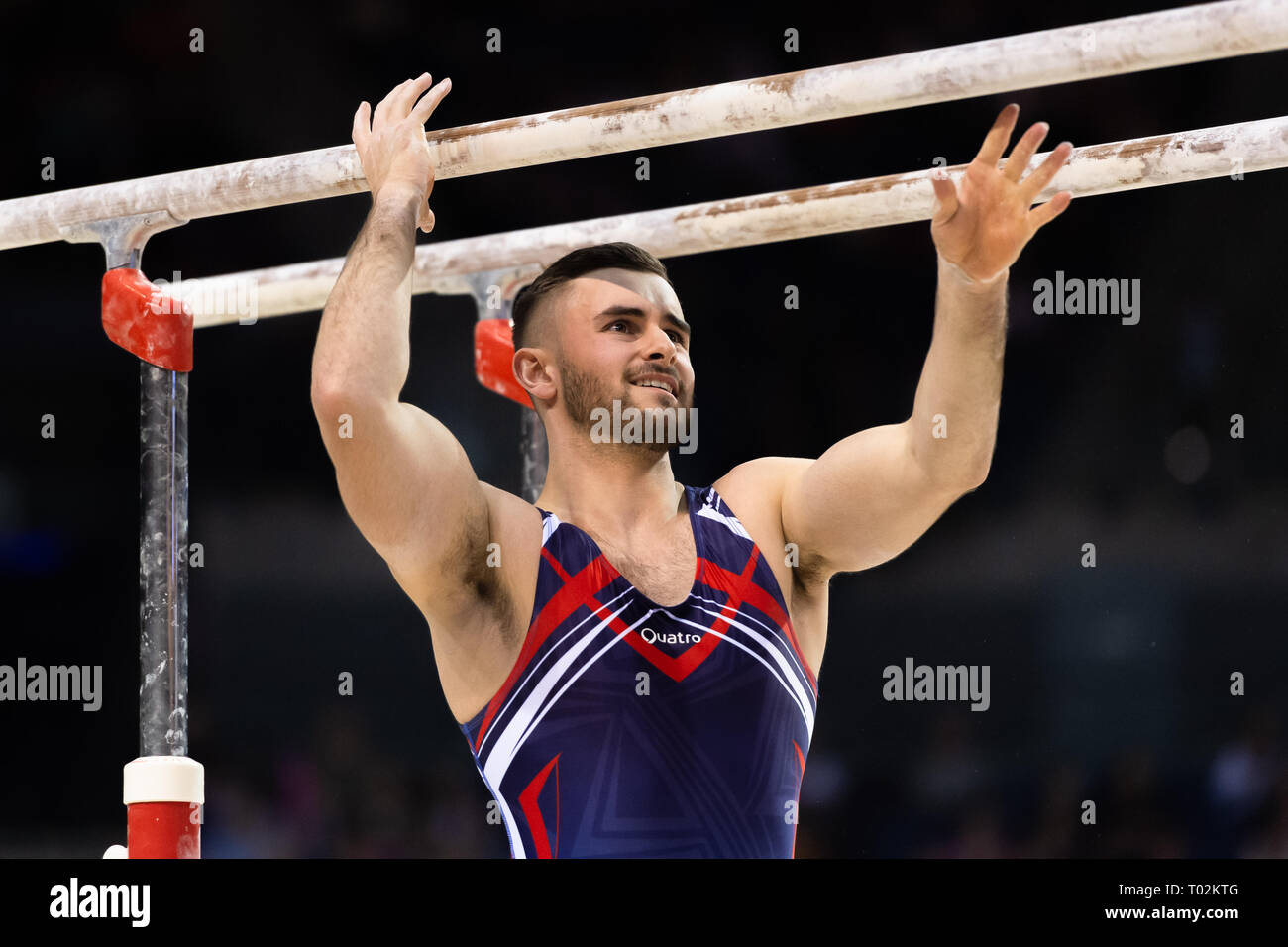 Liverpool, Regno Unito. 16 marzo 2019. Tommy Nicolaou (Guest) esegue la barra parallela nell'uomo il Senior completa durante il 2019 la ginnastica del Campionato Britannico a M&S Bank Arena Sabato, 16 marzo 2019. LIVERPOOL ENGLAND. (Solo uso editoriale, è richiesta una licenza per uso commerciale. Nessun uso in scommesse, giochi o un singolo giocatore/club/league pubblicazioni.) Credito: Taka G Wu/Alamy News Credito: Taka Wu/Alamy Live News Foto Stock