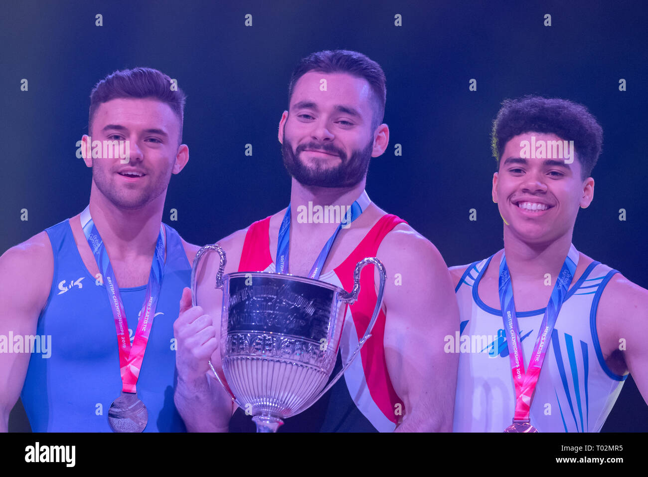 Liverpool, Regno Unito. 16 marzo 2019. James Hall è la champions del 2019 British ginnastica Champions, Giarnni Regini-Morna (2nd) e Jamie Lewis (3rd) negli uomini il Senior completa durante il 2019 la ginnastica del Campionato Britannico a M&S Bank Arena Sabato, 16 marzo 2019. LIVERPOOL ENGLAND. (Solo uso editoriale, è richiesta una licenza per uso commerciale. Nessun uso in scommesse, giochi o un singolo giocatore/club/league pubblicazioni.) Credito: Taka G Wu/Alamy News Credito: Taka Wu/Alamy Live News Foto Stock