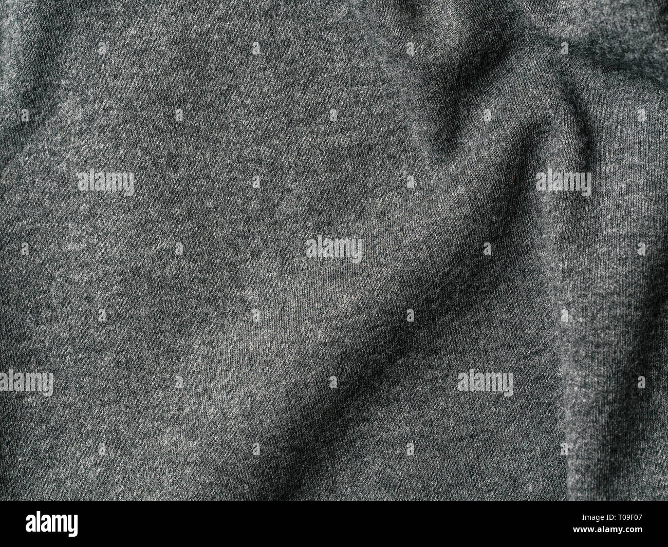 Tessuti di cotone greggi texture. Abbigliamento jersey di cotone sfondo con pieghe Foto Stock