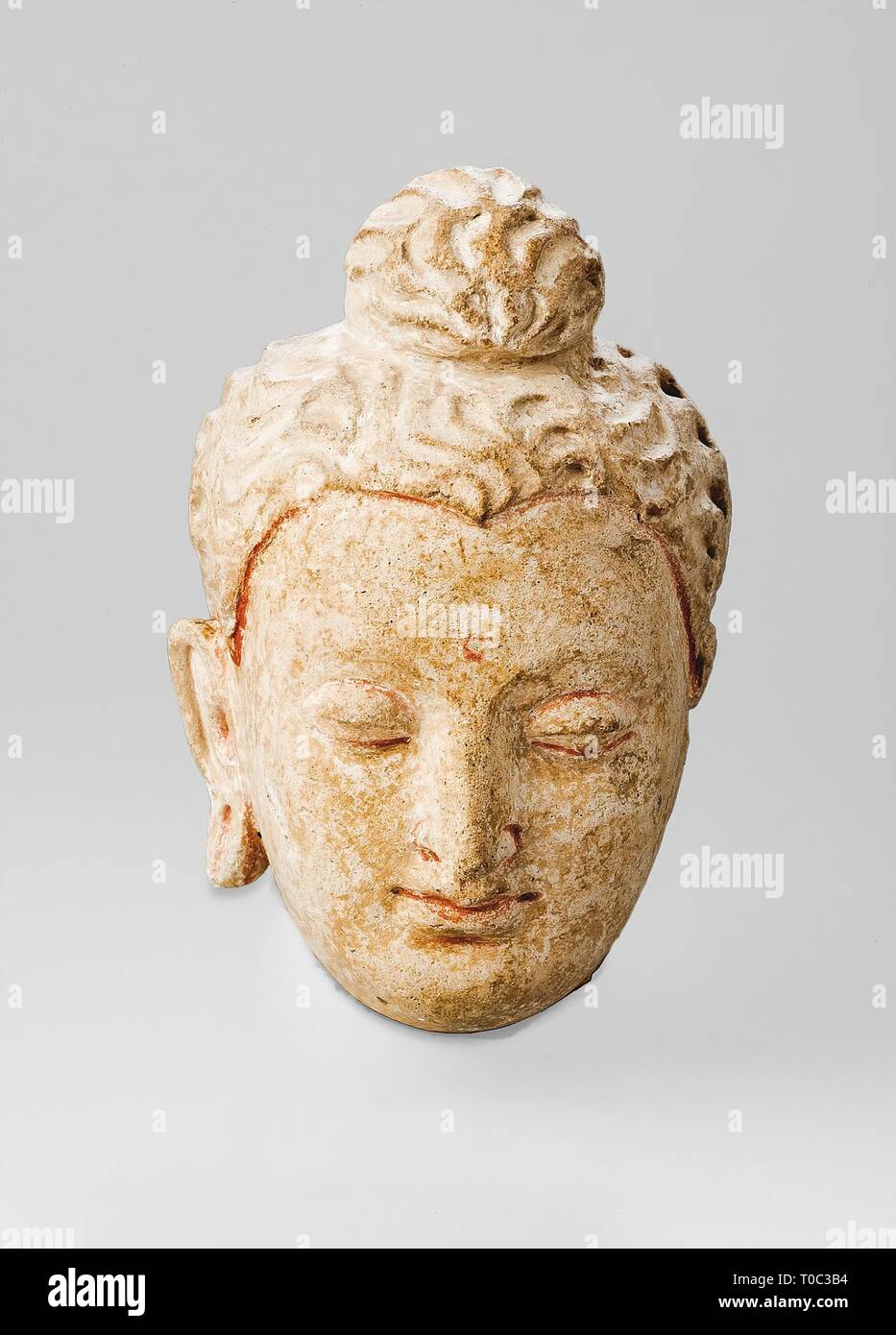 "Testa di un Ststuette del Buddha'. Afghanistan, Hadda, IV - V secolo. Dimensioni: altezza 10 cm. Museo: Membro Hermitage di San Pietroburgo. Foto Stock