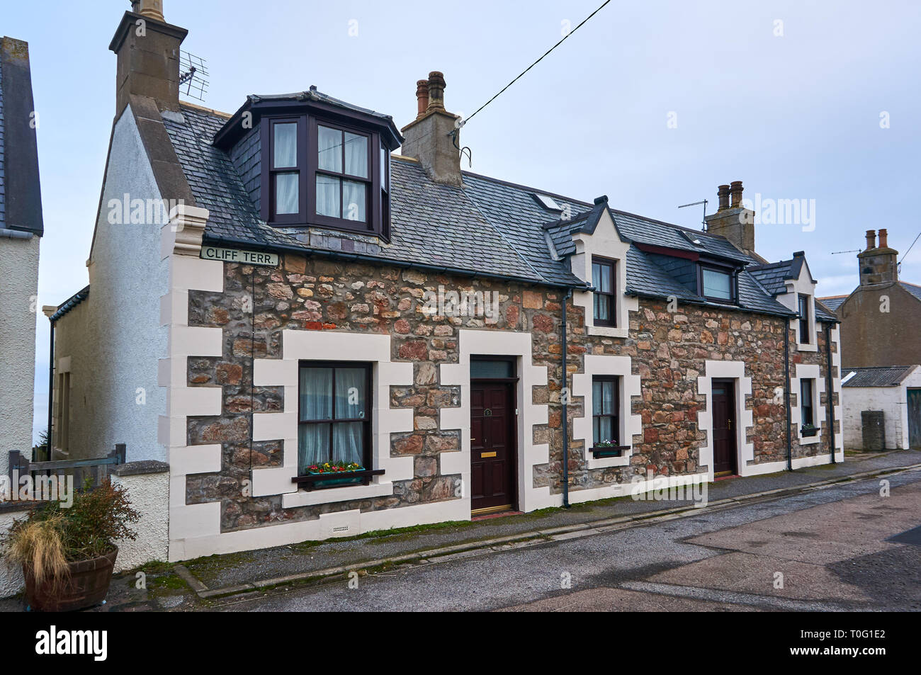 Una tipica casa in una pesca costiera villaggio di Portknockie nel nord della Scozia, Regno Unito Foto Stock