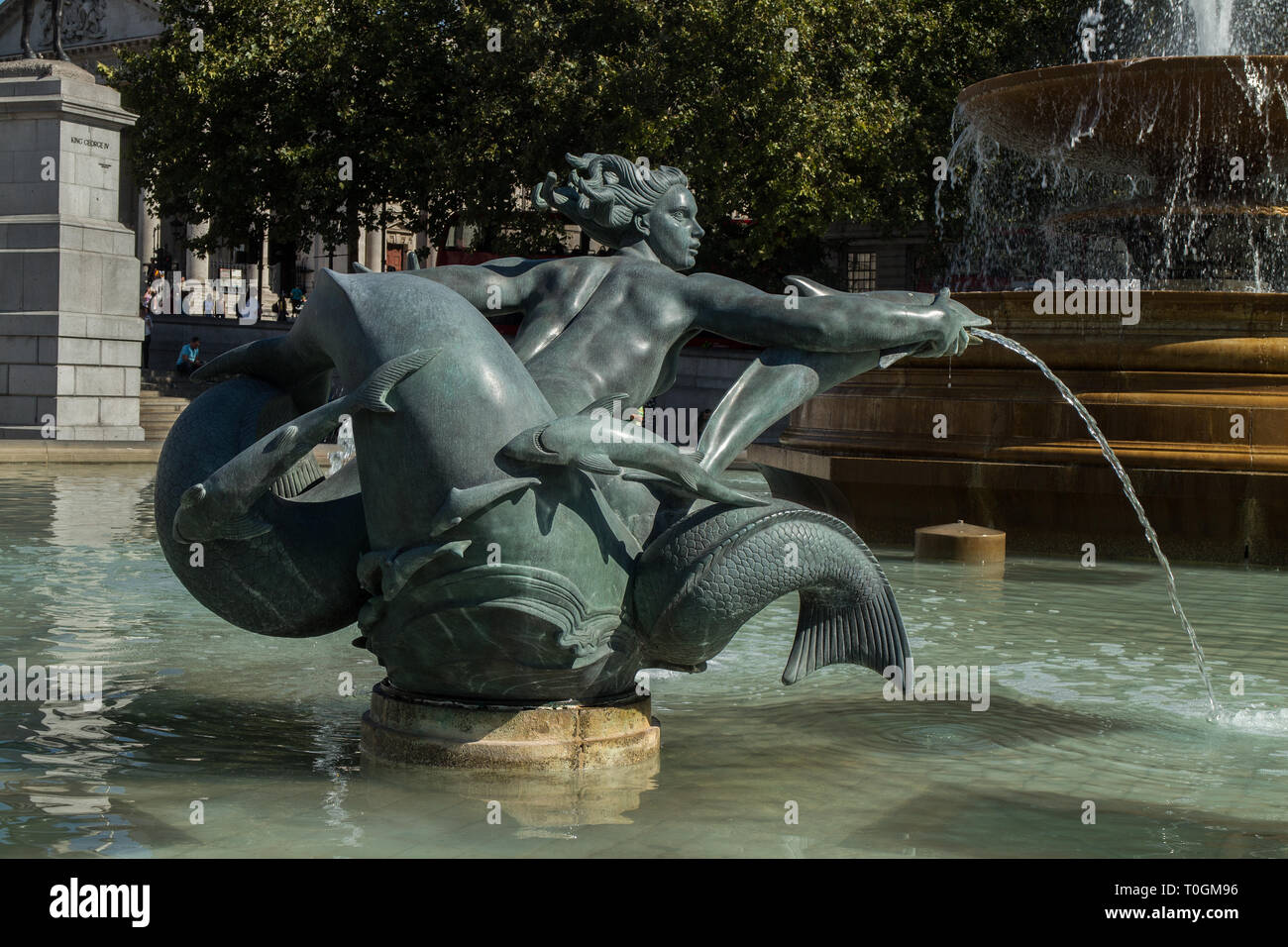 Triton e fontana dei Delfini a Trafalgar Square, Londra Foto Stock