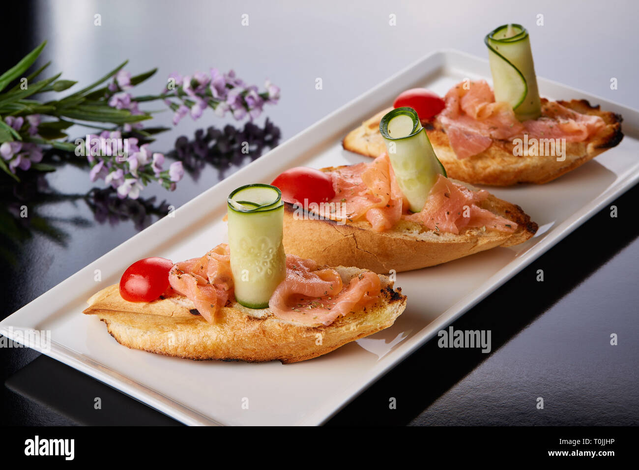 Filetto di pesce sul pane Foto Stock