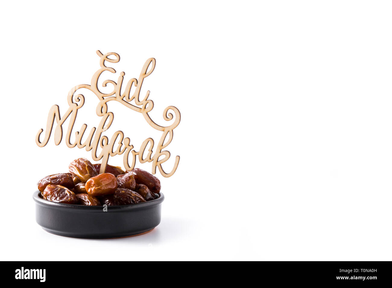 Date e Eid Mubarak messaggio isolati su sfondo bianco. Copyspace Foto Stock