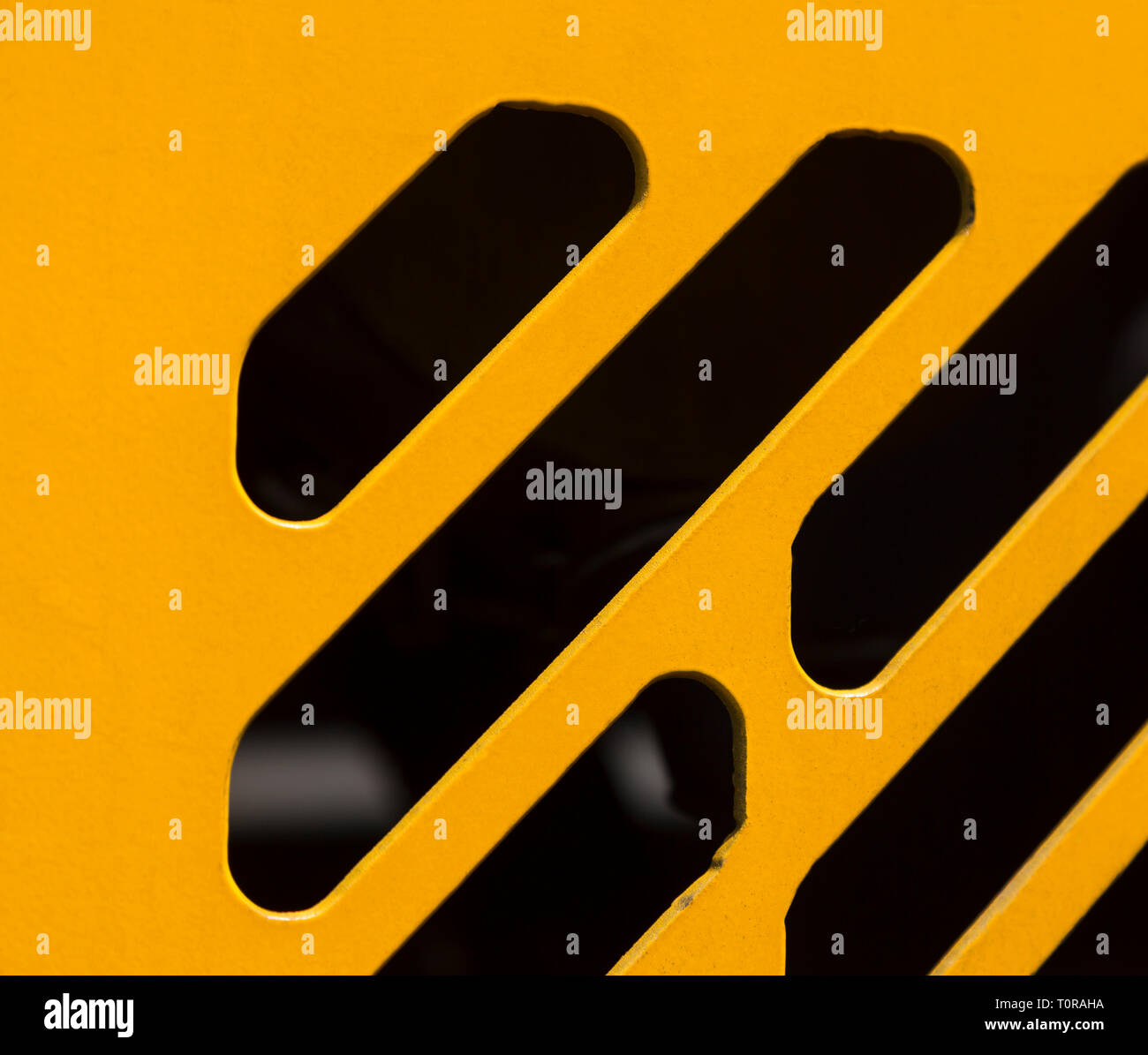 Feritoie di ventilazione per il raffreddamento del motore nel corpo di giallo macchine stradali close-up Foto Stock