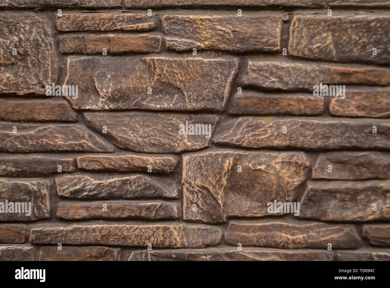 Bronze tessiturali sfondo, pareti di granito, arenaria pietra di muratura Foto Stock