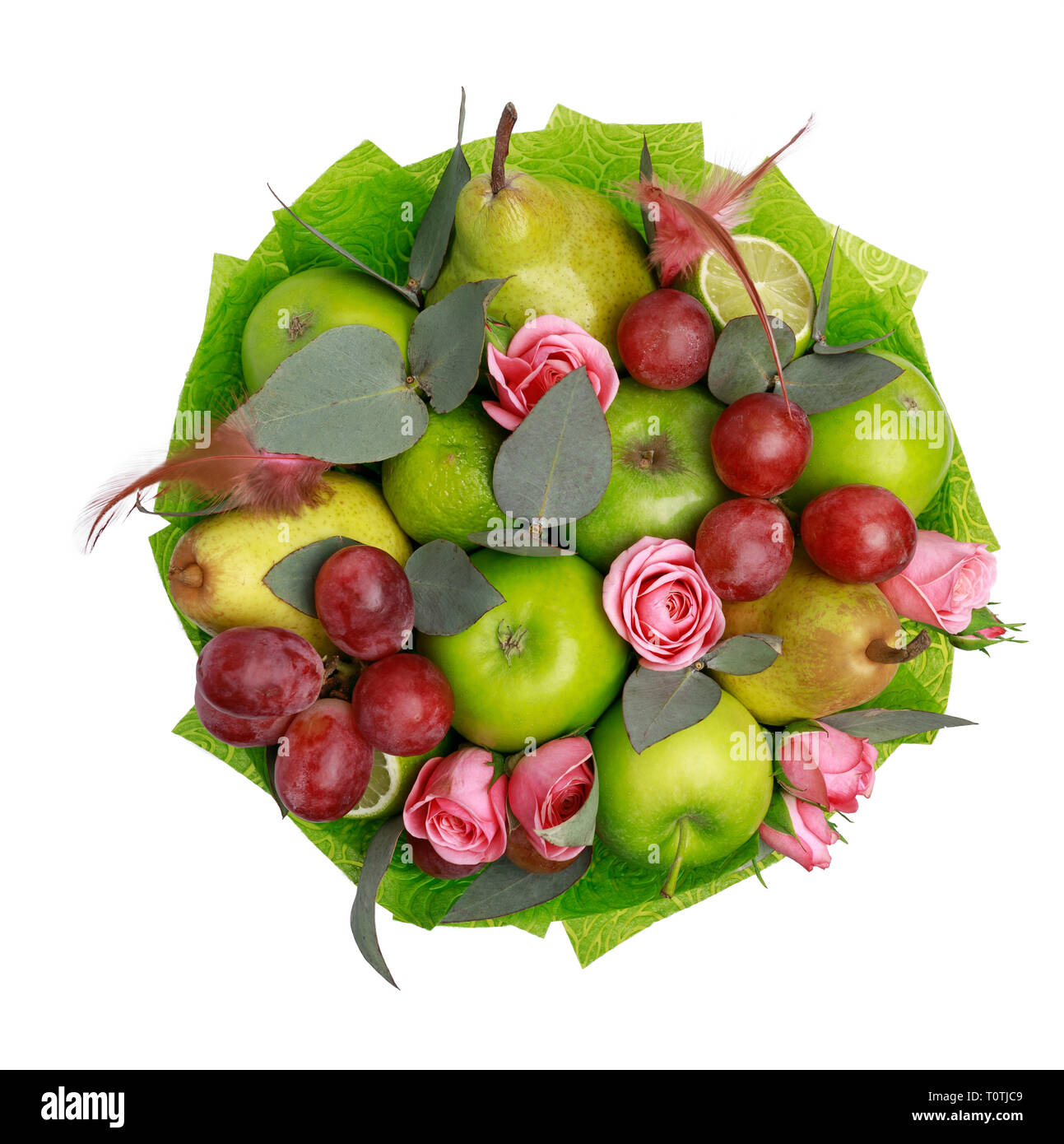 Unico dono commestibili in forma di un bouquet di frutti su uno sfondo bianco. Vista da sopra Foto Stock