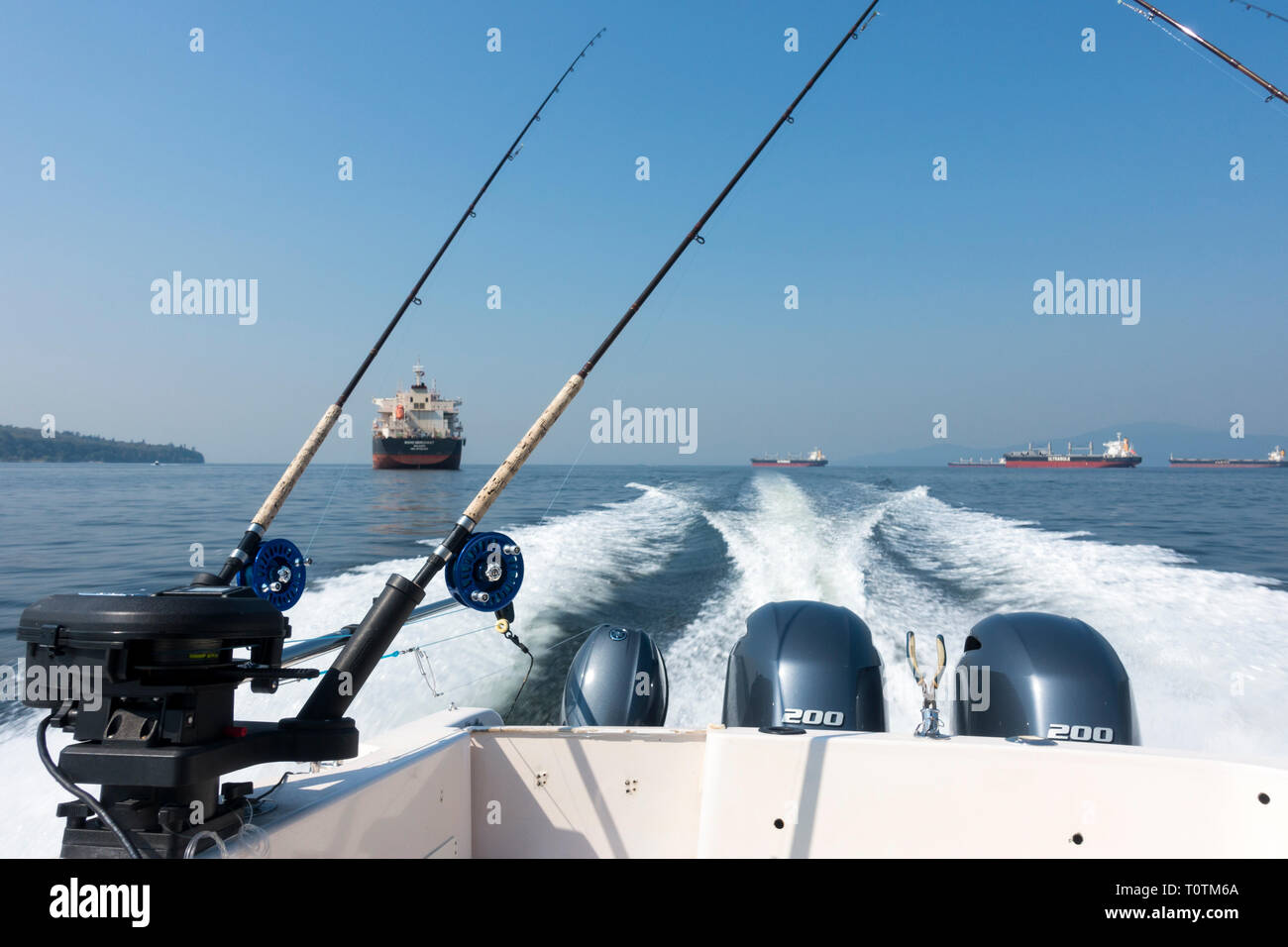 Una vista posteriore di una base di Vancouver turistica salmone charter barche da pesca Foto Stock