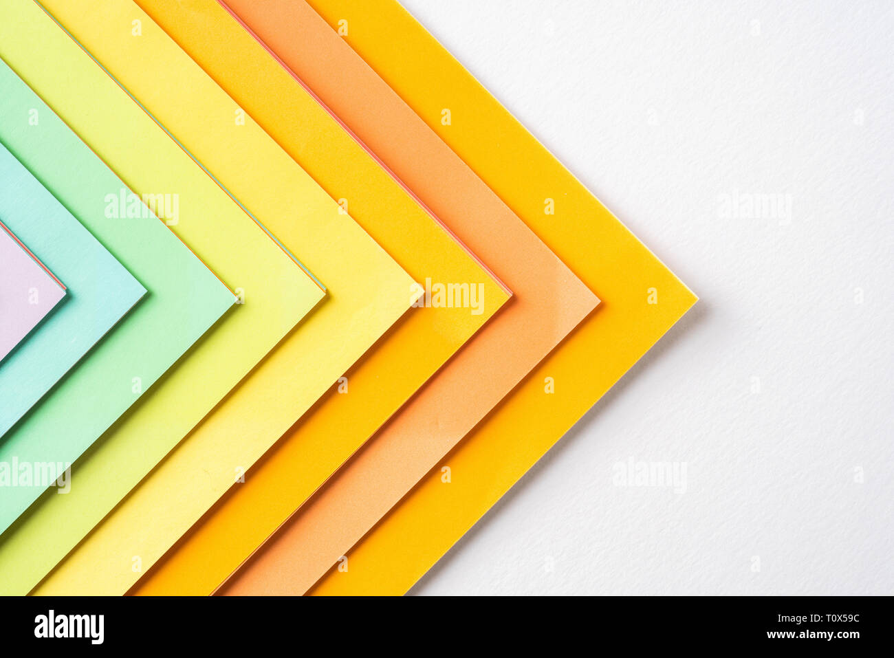 Concetto di Design - carta colorata lo sfondo con la leadership, il lavoro di squadra concepimento Foto Stock