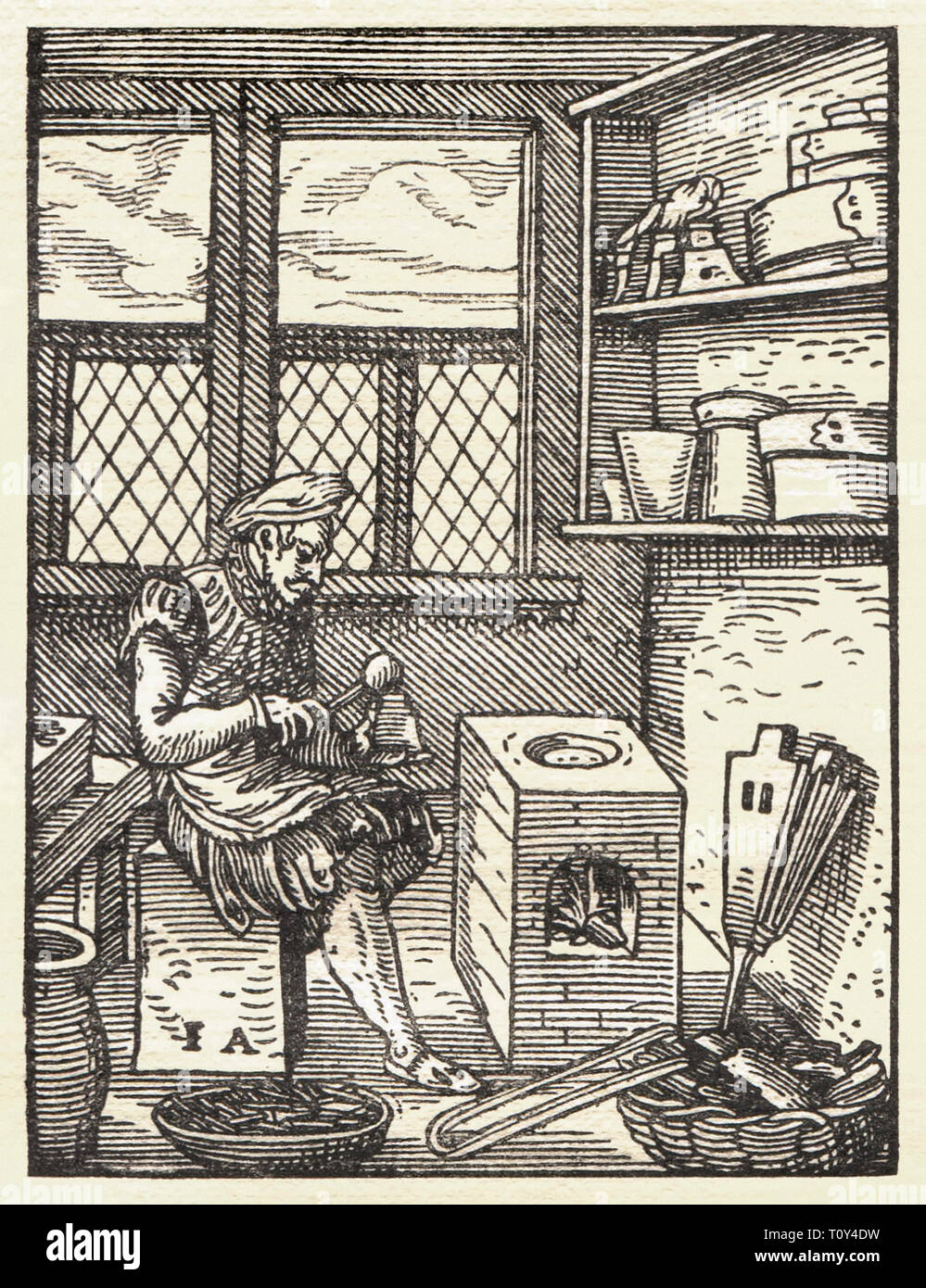 Un punchcutter preparare una lettera punzone per produrre il carattere tipografico da utilizzare in tipografia. Xilografia da Jost Amman (1539-1591) da Das Ständebuch pubblicato nel 1568. Foto Stock
