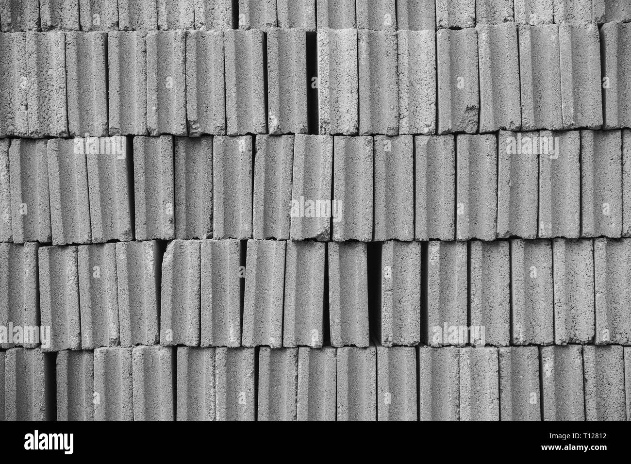 Calcestruzzo di cemento blocchi di calcestruzzo di scorie texture fila di pattern per la creazione dello sfondo. Foto Stock