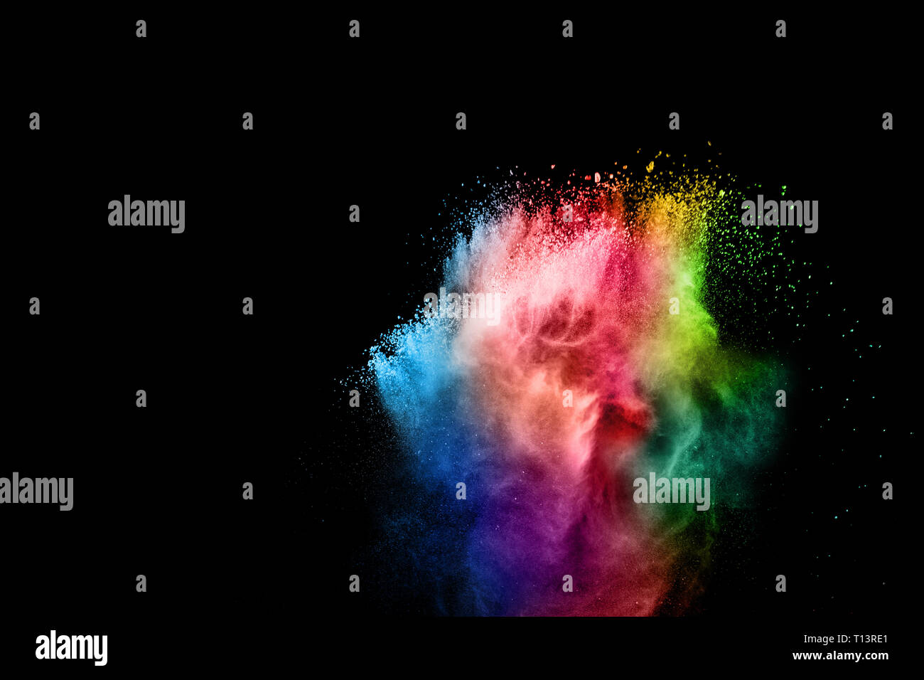 Esplosione colorata per Felice Holi polvere.sfondo astratto di particelle di colore burst o schizzi. Foto Stock
