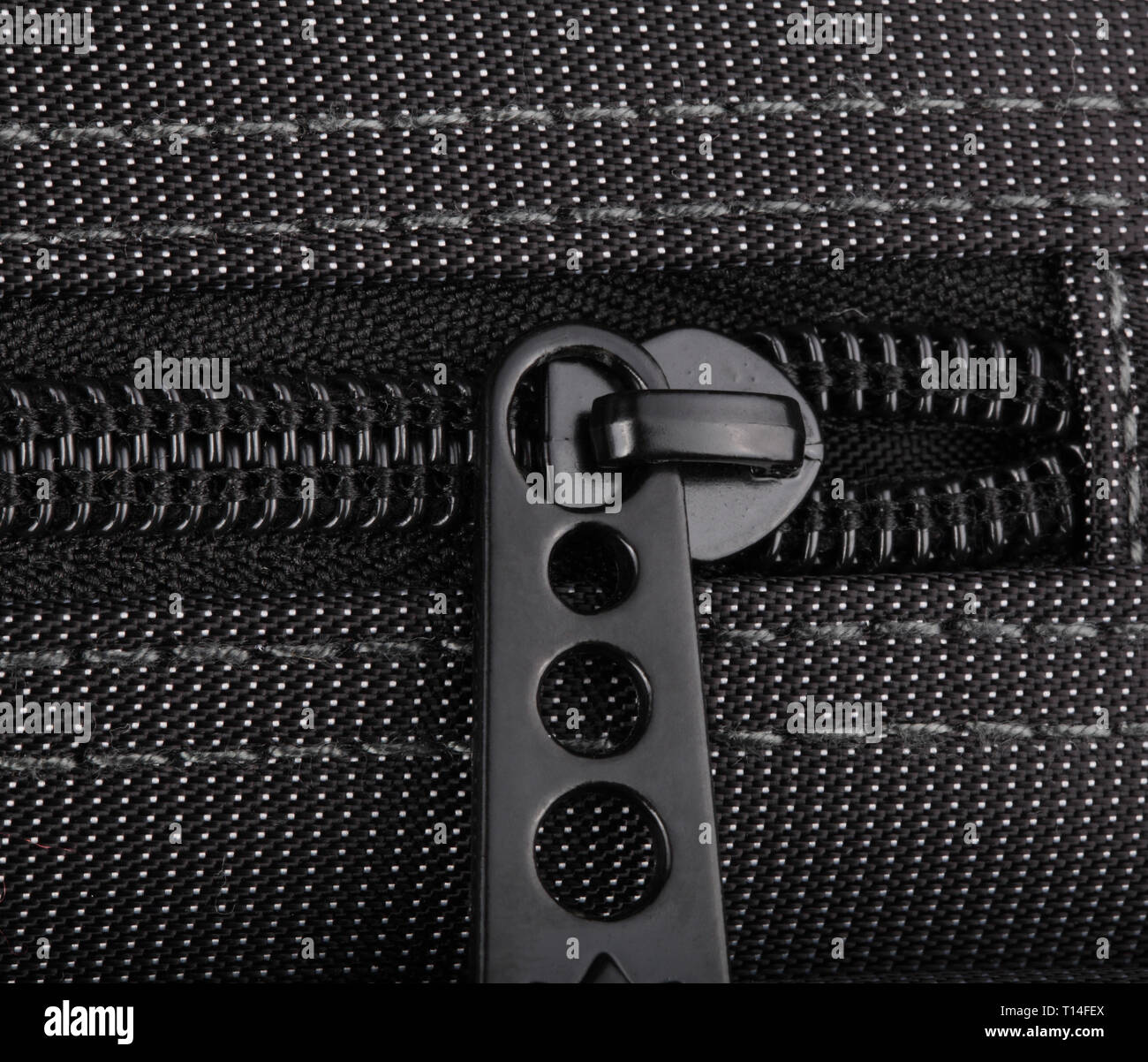 Borsa nera con puntini bianchi Foto Stock