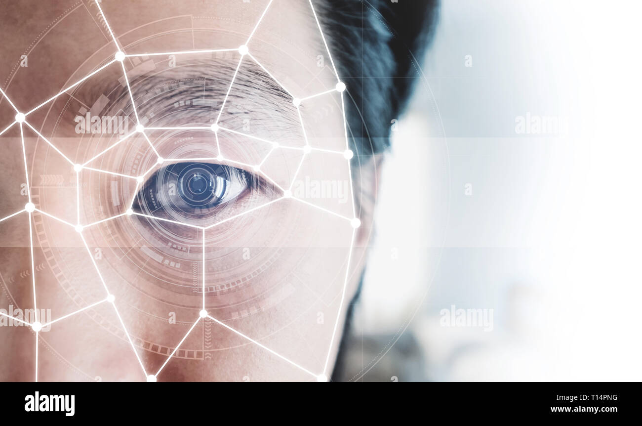 Il riconoscimento facciale, il sistema di sicurezza della tecnologia. Close-up un uomo faccia con futuristica tecnologia di scansione sul volto umano Foto Stock