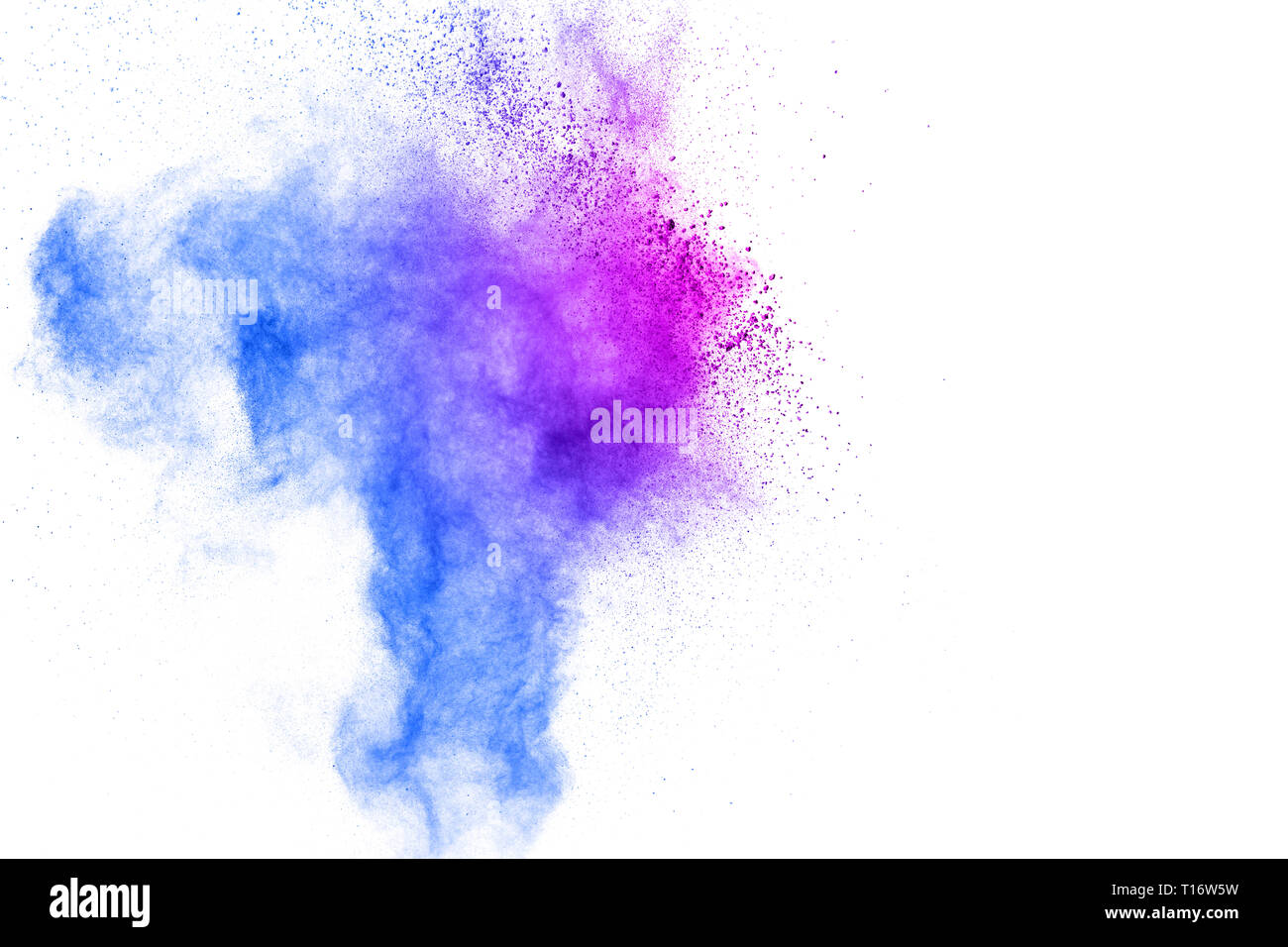 Bloccare il movimento della polvere colorata esplosioni isolati su sfondo bianco.colore delle particelle di polvere opener sullo sfondo Foto Stock