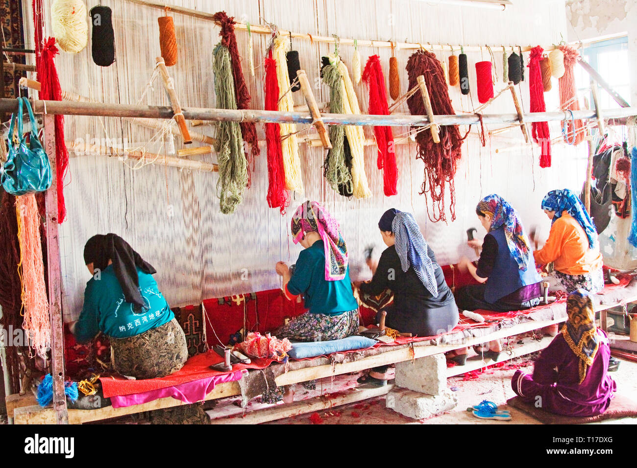 I tappeti e la seta di Hotan sono stati famosi per migliaia di anni, Hotan, regione autonoma di Xinjiang, Cina. Foto Stock