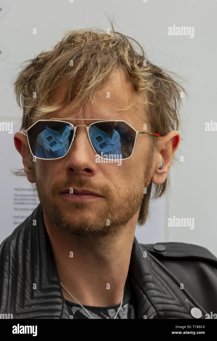 Austin, Texas, Stati Uniti d'America. 23 Mar, 2019. Muse membro della band, Matt Bellamy, orologi il NTT gara IndyCar auto pratica presso il circuito delle Americhe prima di INDYCAR Classic in Austin, Texas. (Credito Immagine: © Walter G Arce Sr Asp Inc/ASP) Foto Stock