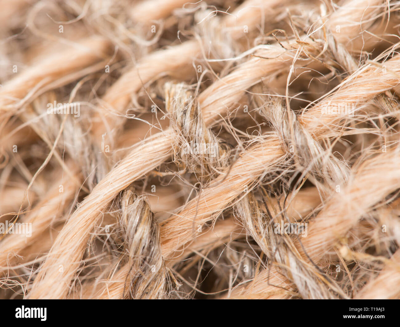 Matassa di iuta spago su saccheggi. Gomitolo di corda naturale. Close up Foto Stock