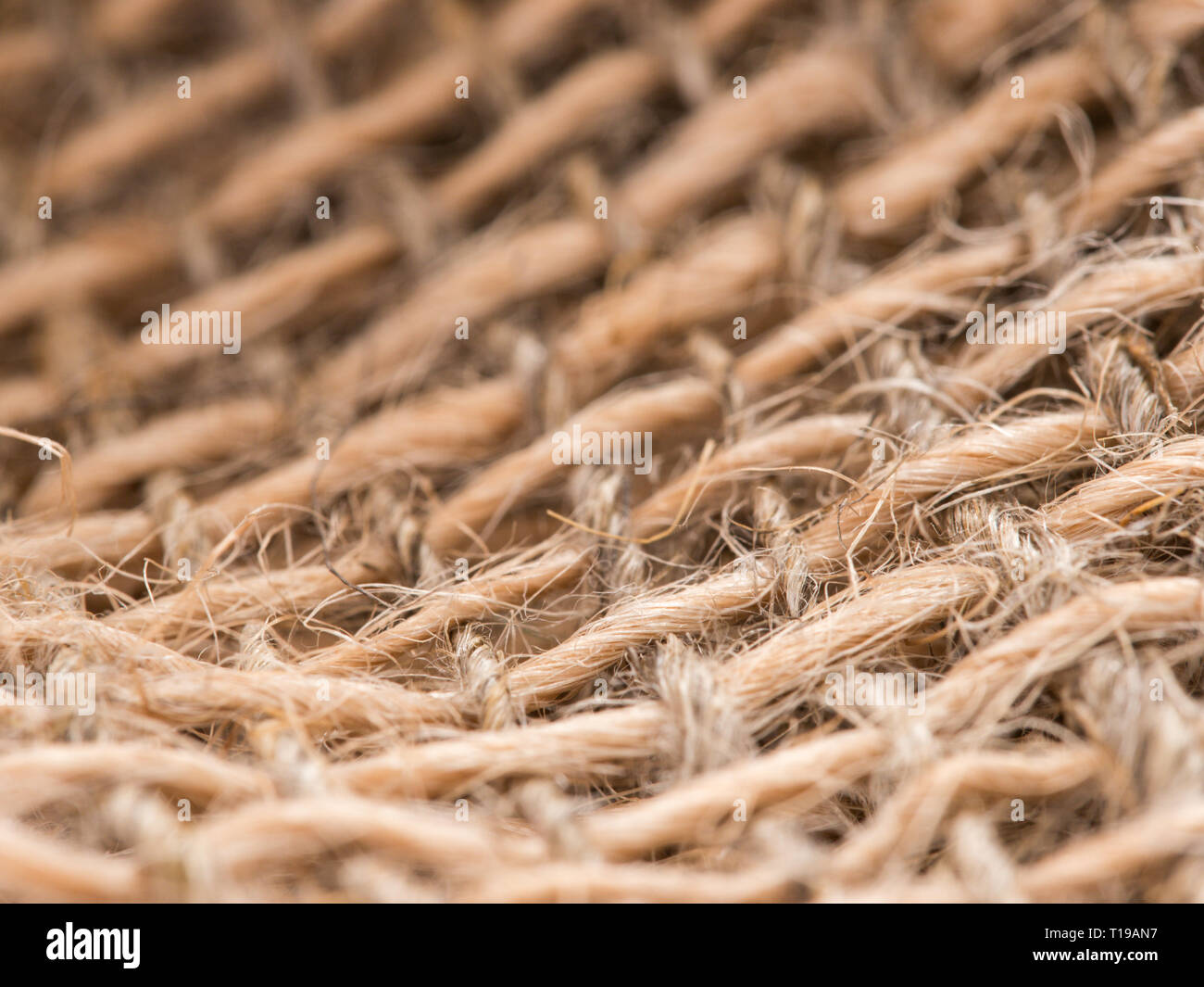 Matassa di iuta spago su saccheggi. Gomitolo di corda naturale. Close up Foto Stock