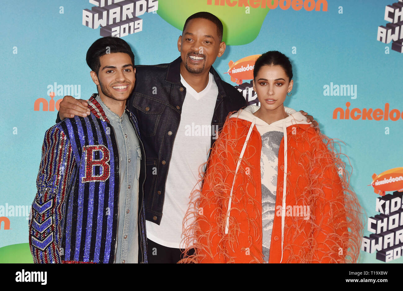 LOS ANGELES, CA - MARZO 23: (L-R) Mena Massoud, Will Smith e Naomi Scott frequentare Nickelodeon's 2019 Kids Choice Awards a Galen Center su Marzo 23, 2019 a Los Angeles, California. Foto Stock