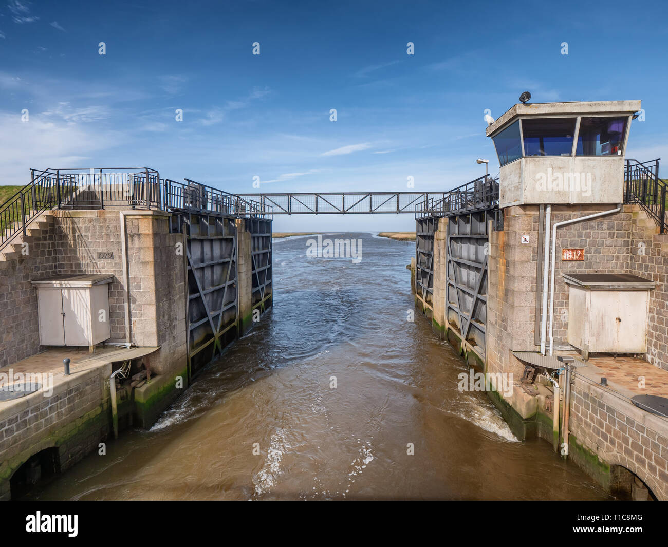 Kammerslusen cancelli aperti per il mare di Wadden nei pressi di Ribe, Danimarca Foto Stock