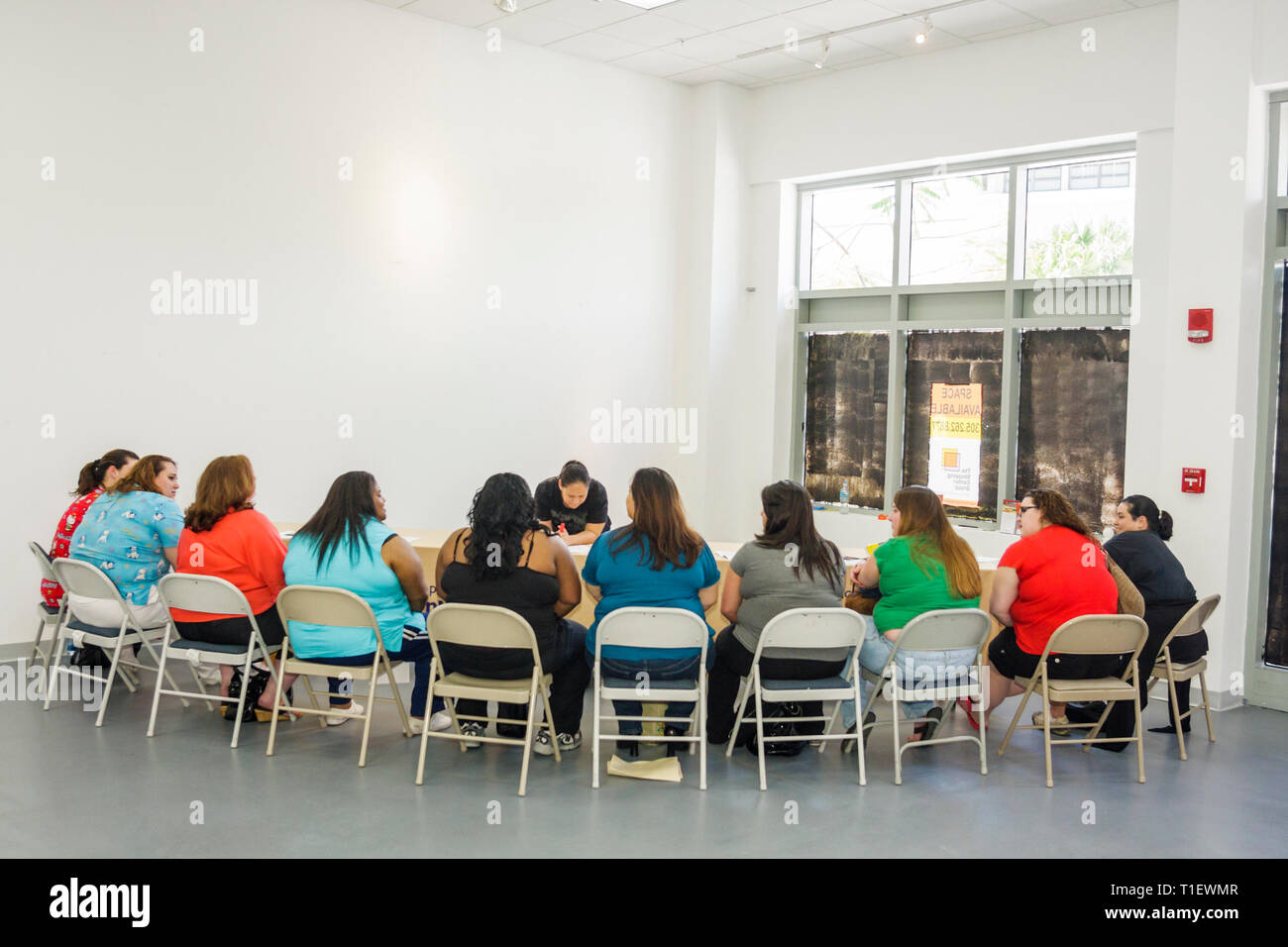 Miami Florida,Negozi a Midtown,The Biggest Loser,TV show,reality TV,audiition,tryout,casting,overweight obese obesità grasso pump pesante rotund st Foto Stock