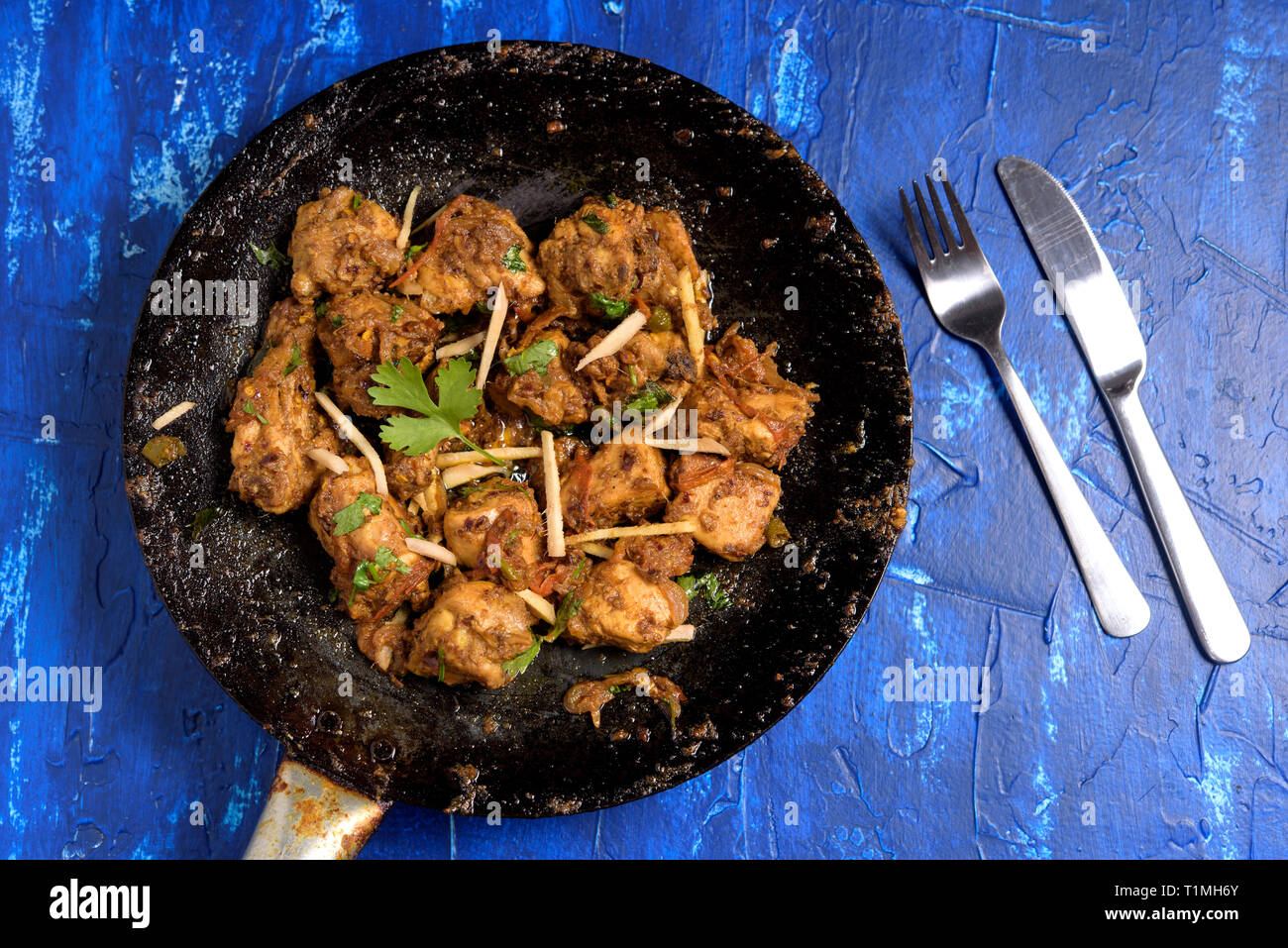 Pollo speziato all'Indiana Tawa RFI Foto Stock